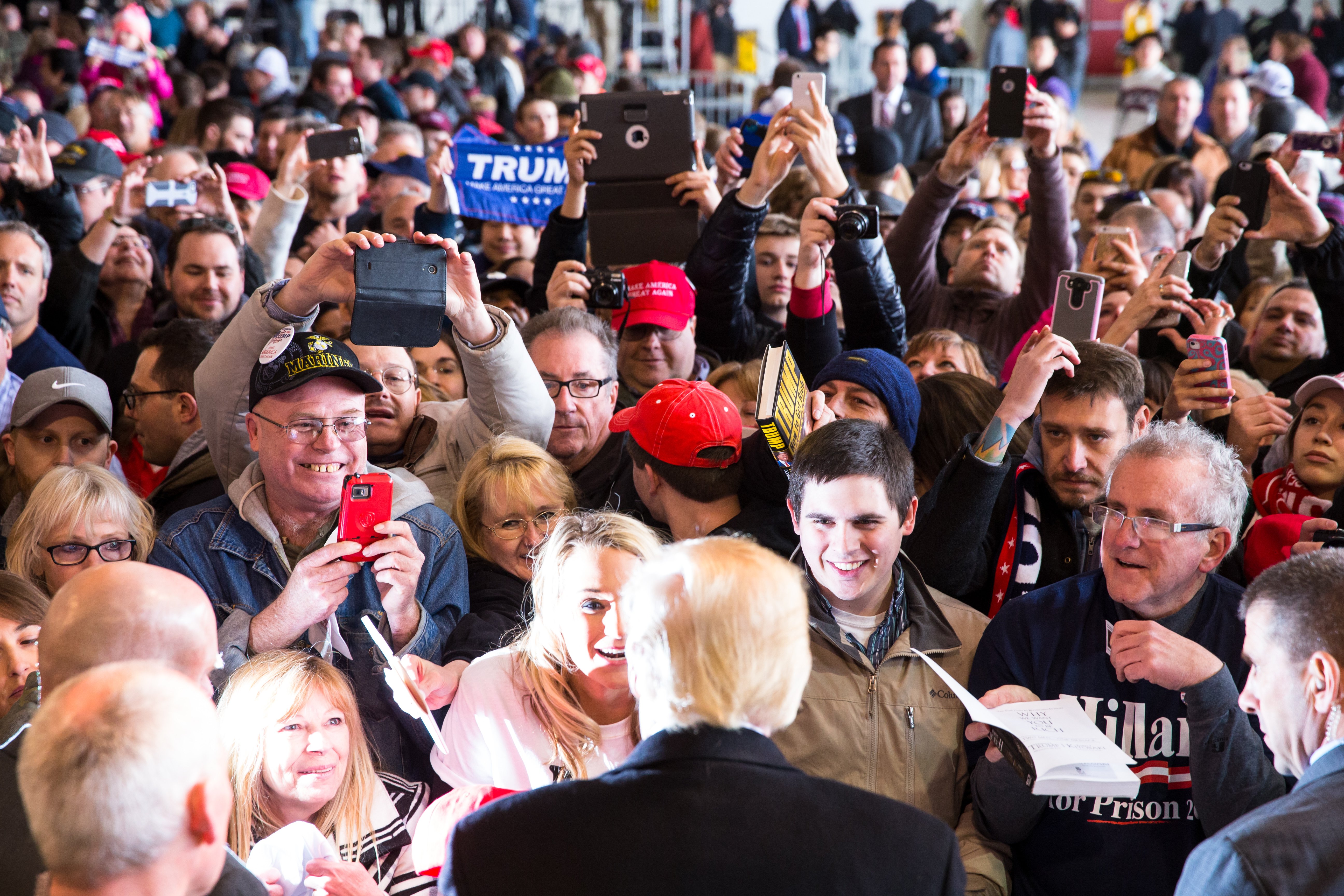 Republican presidential candidate Donald Trump greets the crowd at a rally for his campaign in Rochester, New York on April 10, 2016.