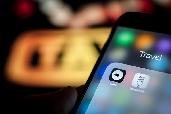The Uber ride sharing application is on a portable device in this photo illustration on December 6, 2017.