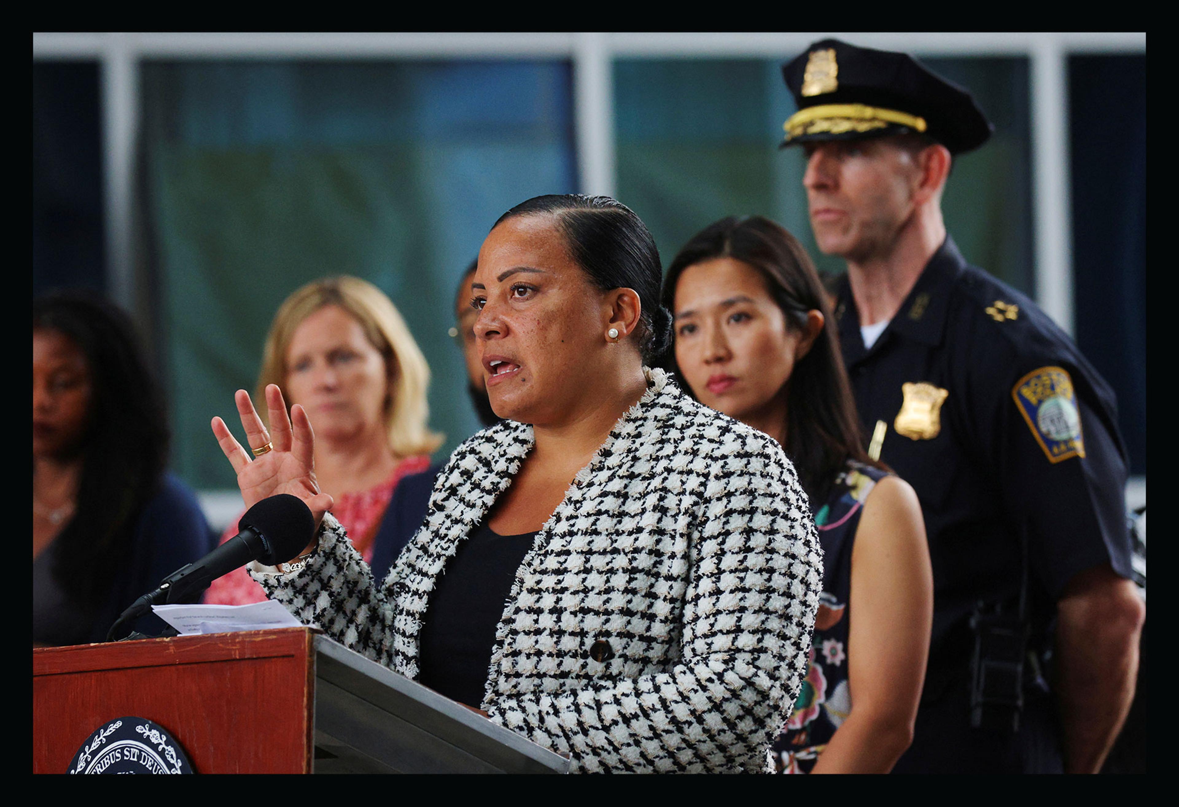 U.S. Attorney for Massachusetts Rachael Rollins, with Boston Mayor Michelle Wu and acting Boston Police Commissioner Gregory Long, speaks to reporters about the march through Boston by supporters of the white nationalist group Patriot Front during the Fo