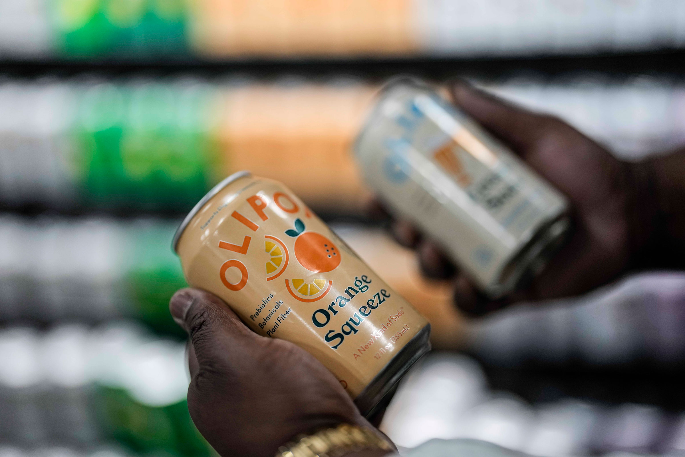 Cans of Olipop at a Kroger supermarket