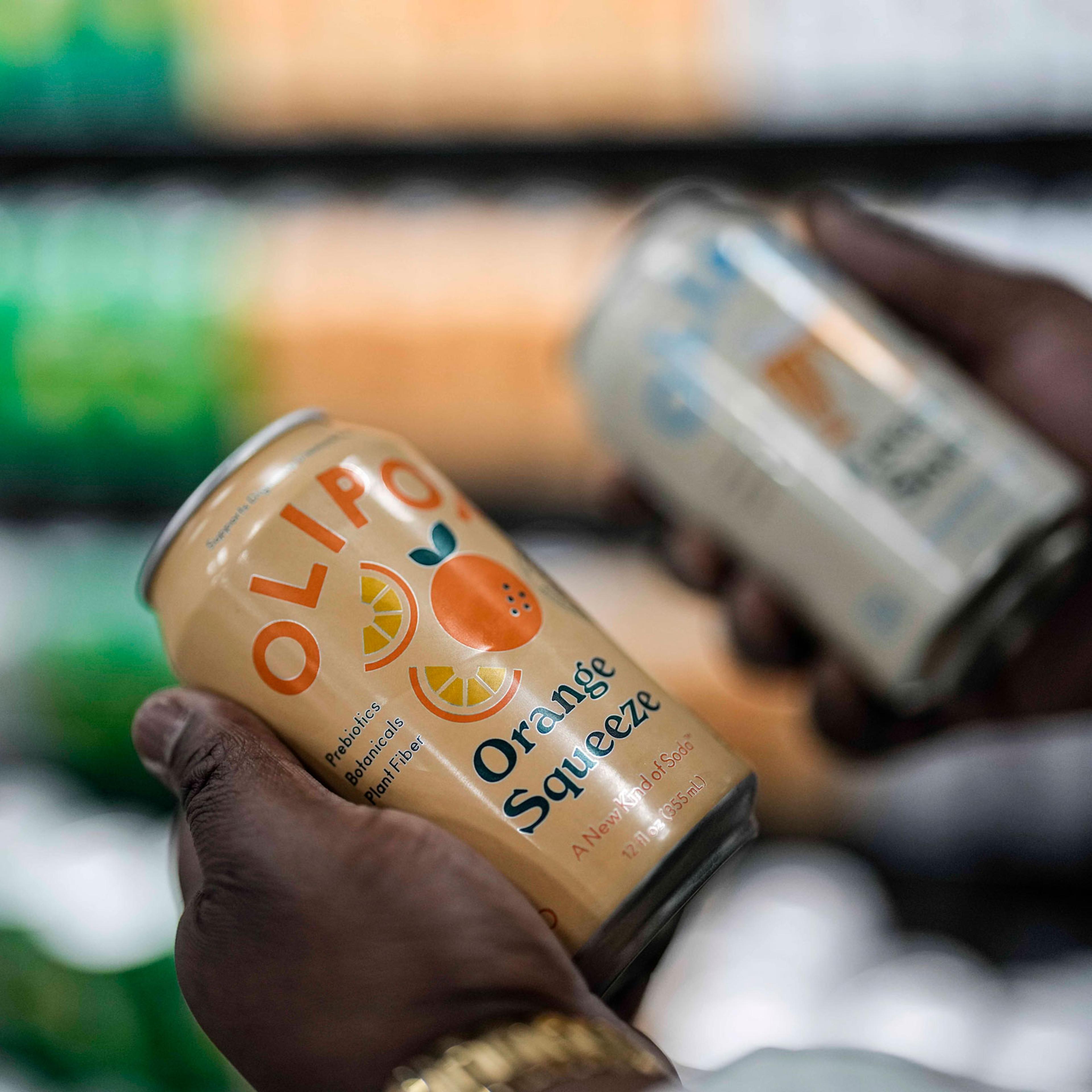 Cans of Olipop at a Kroger supermarket