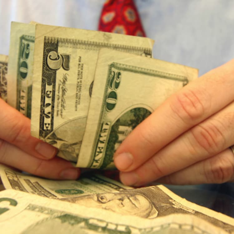 hands-holding-cash