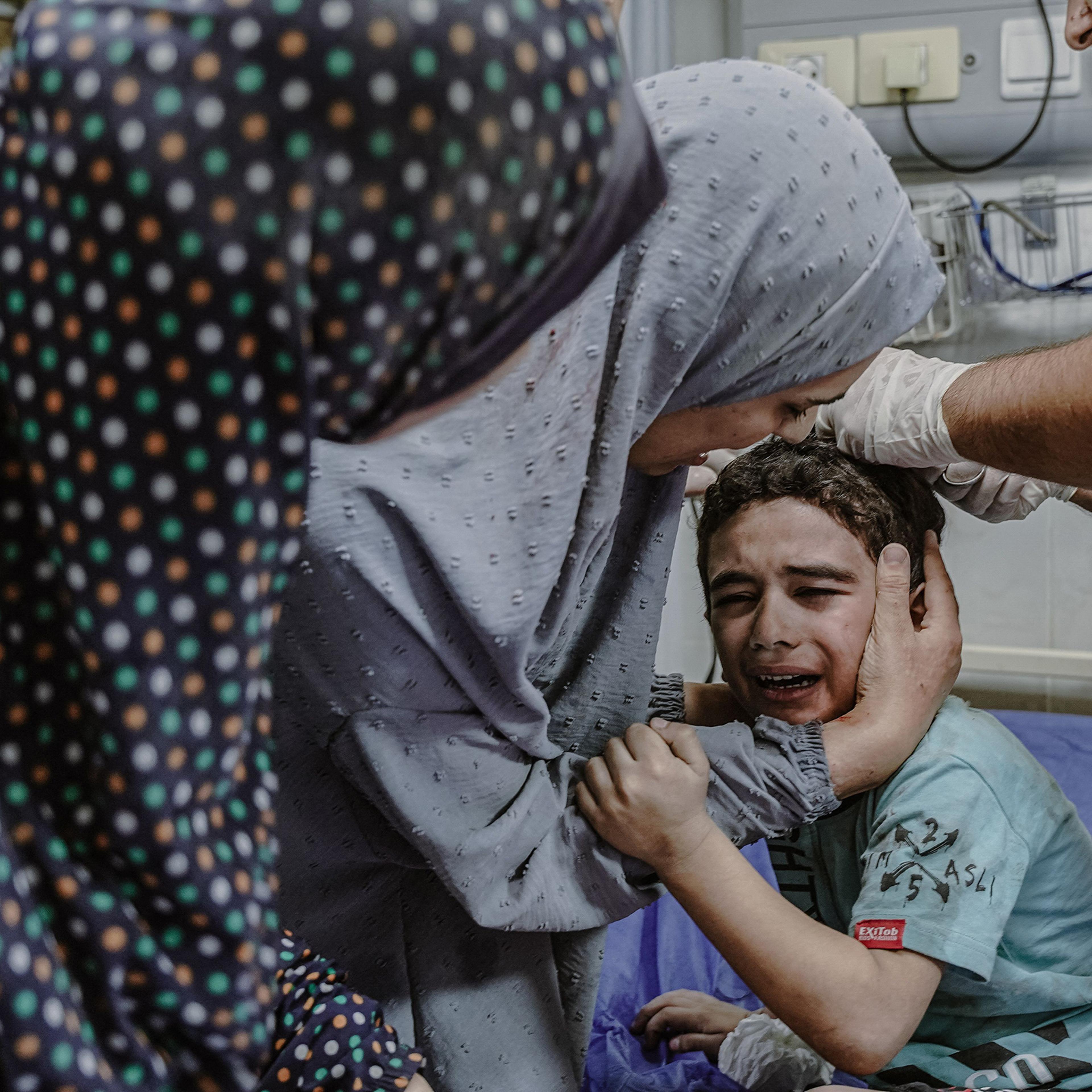 Injured Palestinian children at Al Quds hospital on the sixth day of the war, Oct. 13.