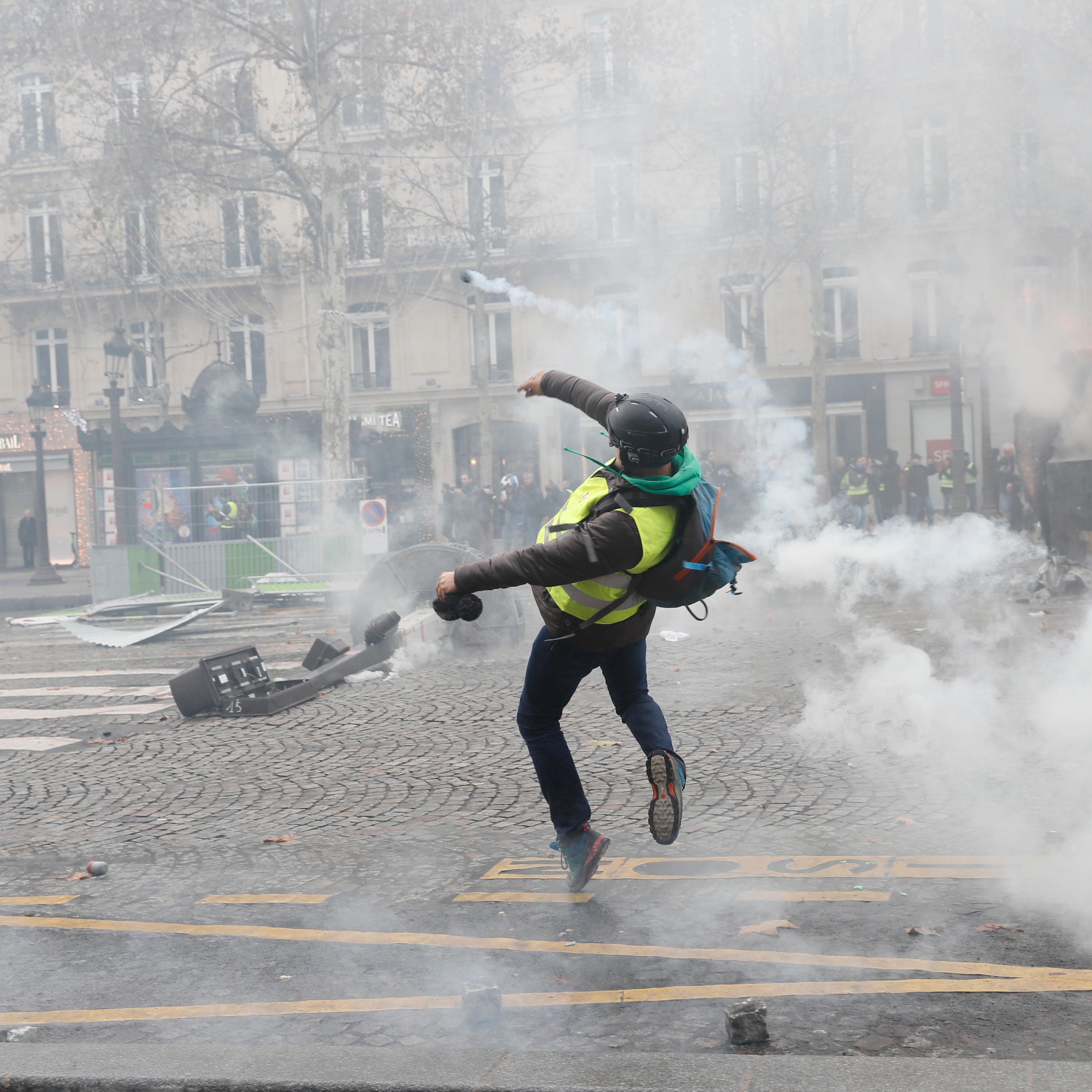 Macron Calls For Tough Stance On "Gilets Jaunes" Disruption