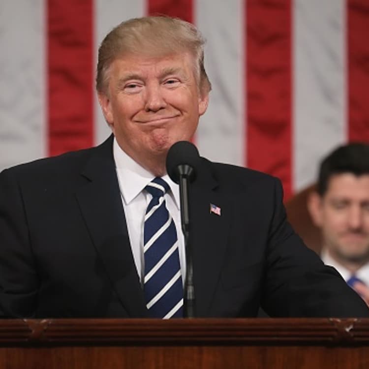 Vice President Mike Pence (L) and Speaker of the House Paul Ryan (R) listen as US President Donald J. Trump (C) delivers his first address to a joint session of Congress from the floor of the House of Representatives in Washington, DC, USA, 28 February 2