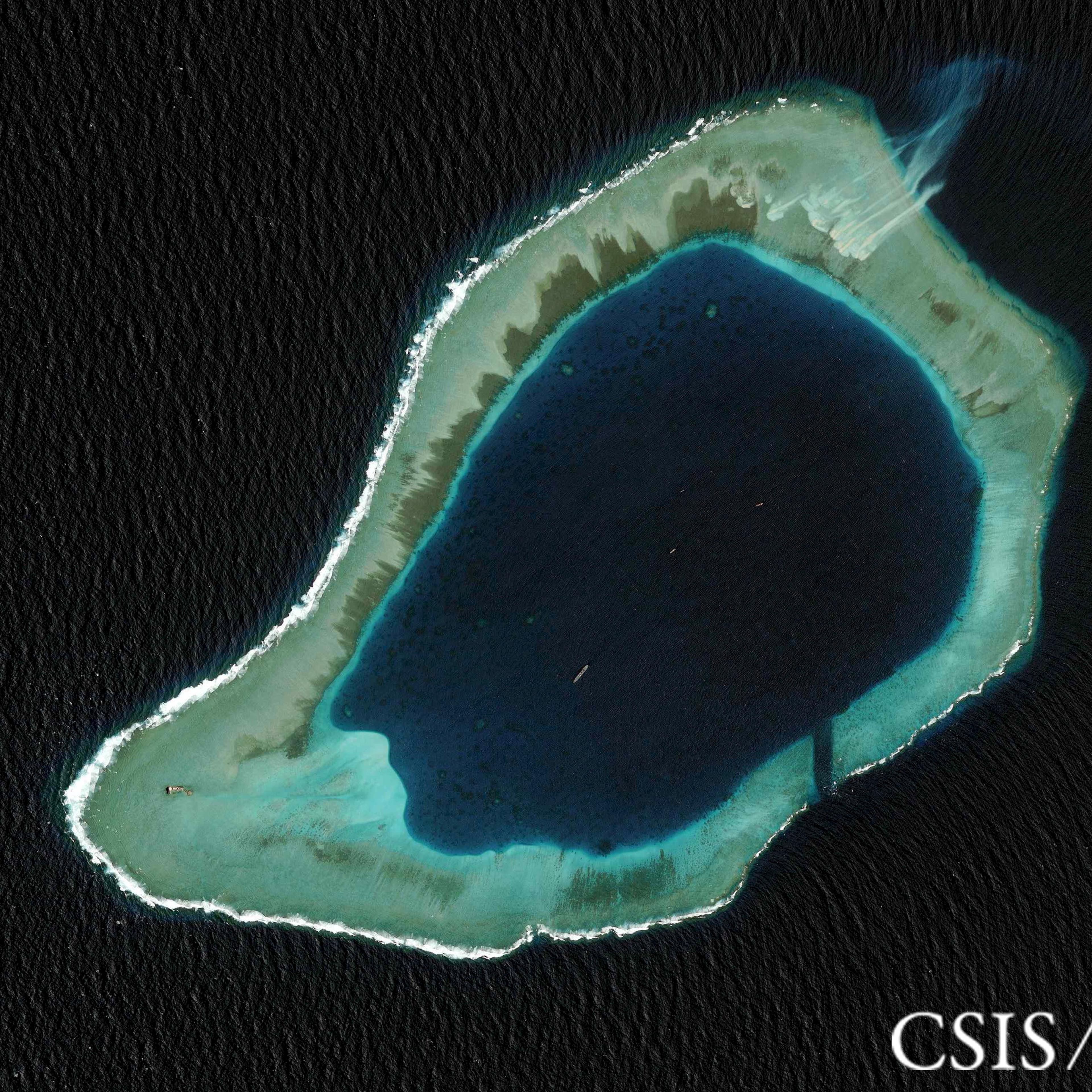 Subi reef, located in the disputed Spratly Islands in the South China Sea, is shown in this file handout CSIS Asia Maritime Transparency Initiative satellite image