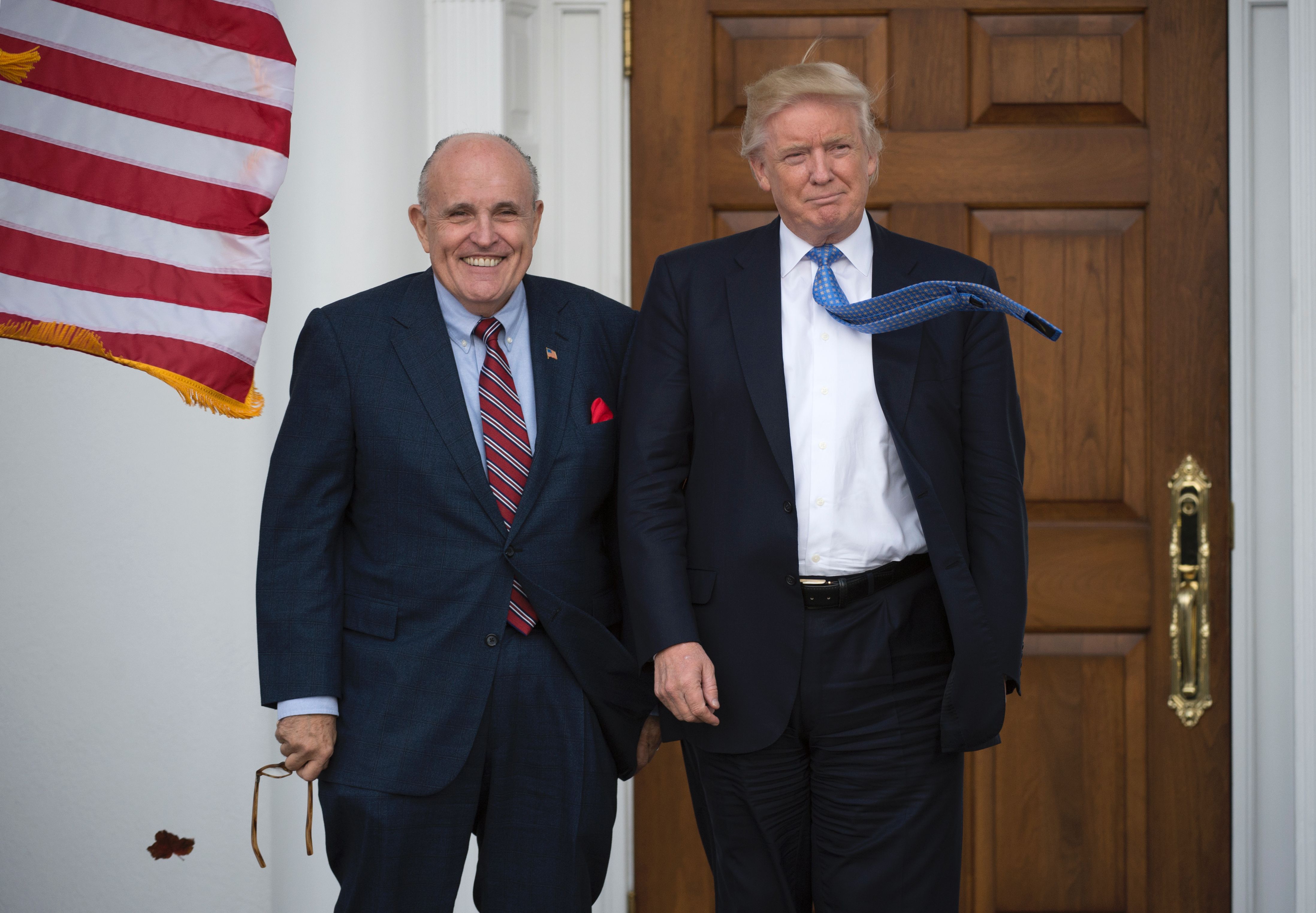 President-elect Donald Trump meets with former New York City Mayor Rudy Giuliani at the clubhouse of Trump National Golf Club November 20, 2016 in Bedminster, New Jersey.