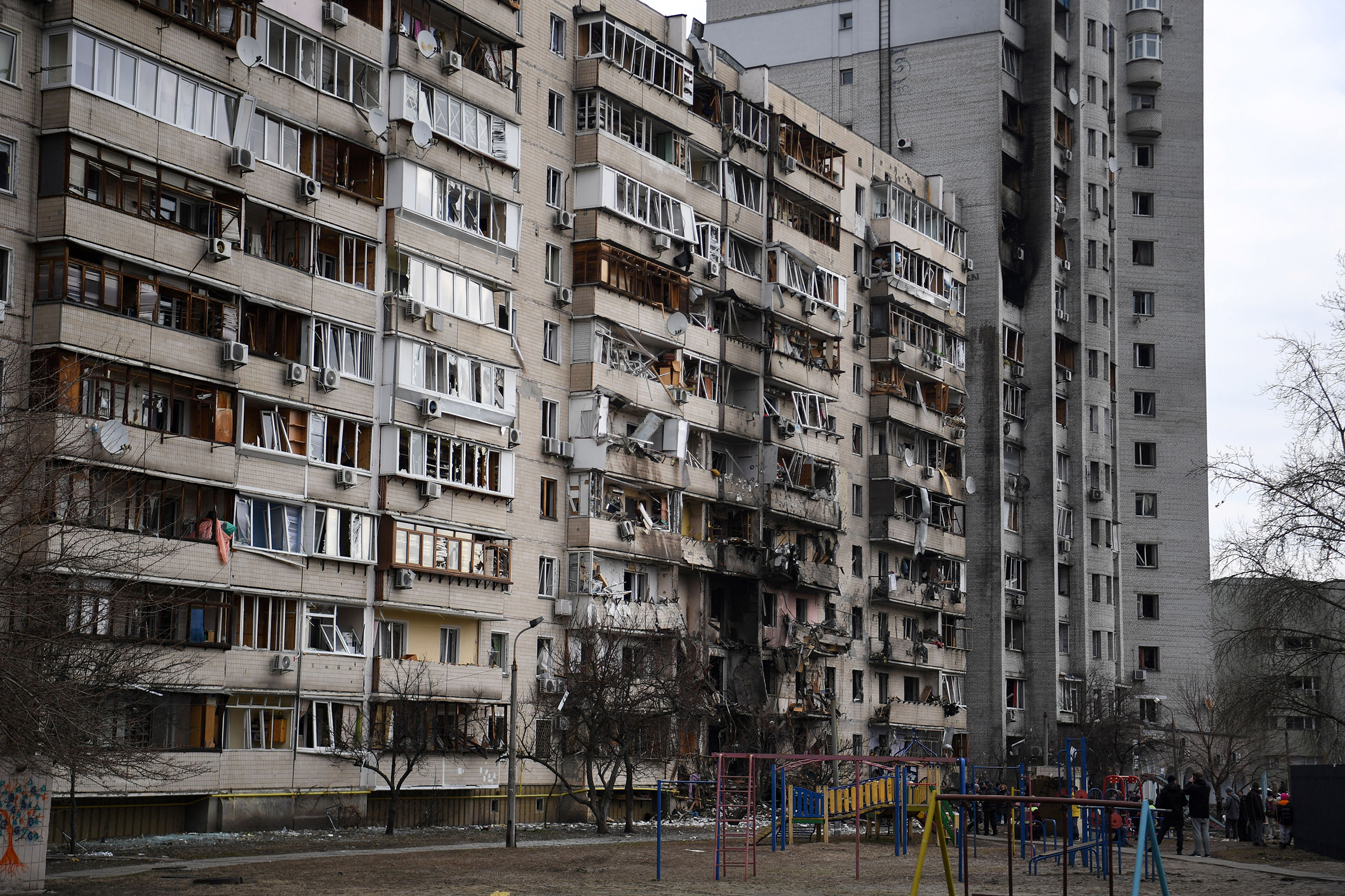 A general view of a damaged residential building at Koshytsa Street, a suburb of the Ukrainian capital Kyiv, where a military shell allegedly hit, on February 25, 2022.