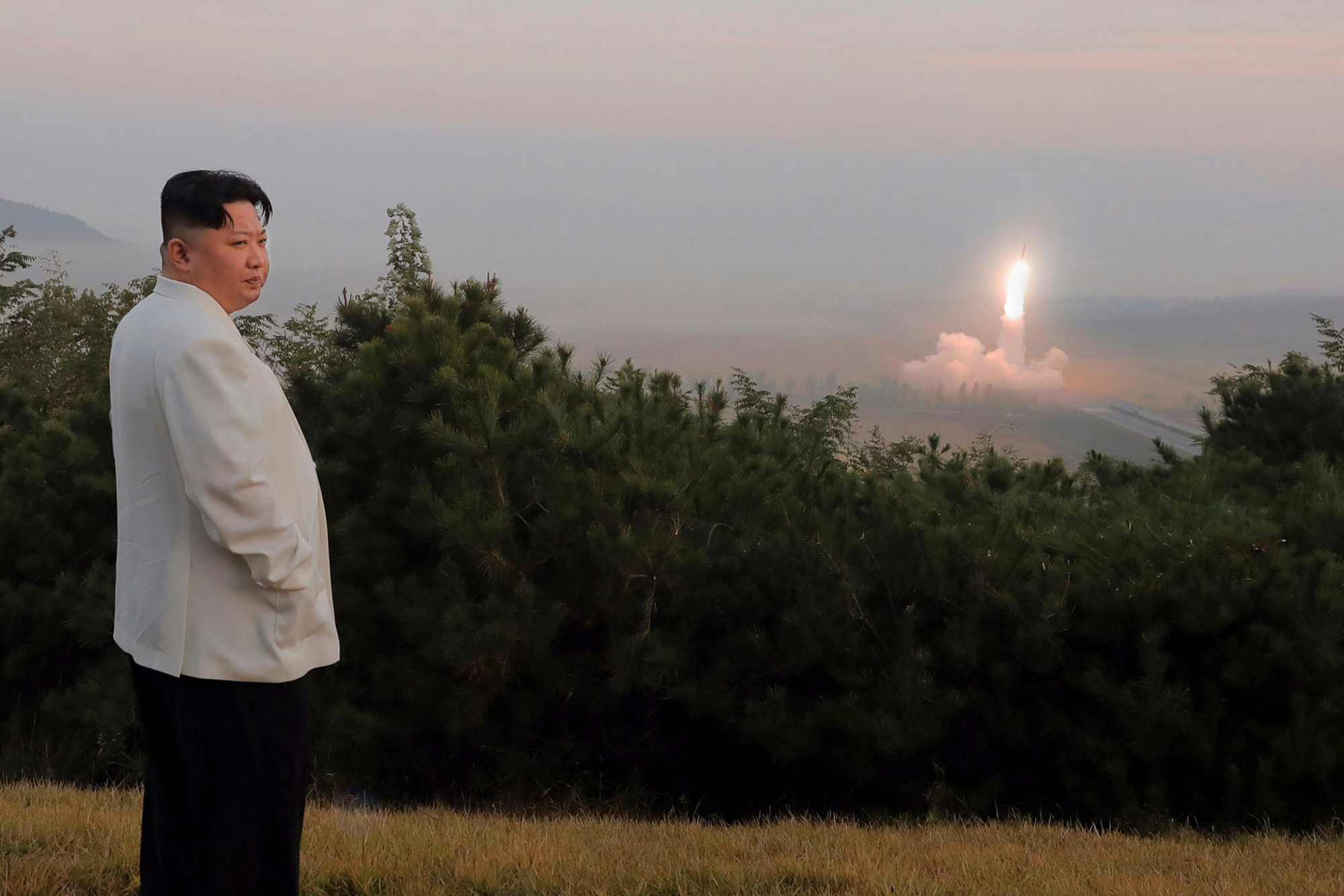 FILE - This photo provided by the North Korean government, North Korean leader Kim Jong Un inspects a missile test at an undisclosed location in North Korea, as taken sometime between Sept. 25 and Oct. 9. Independent journalists were not given access to 