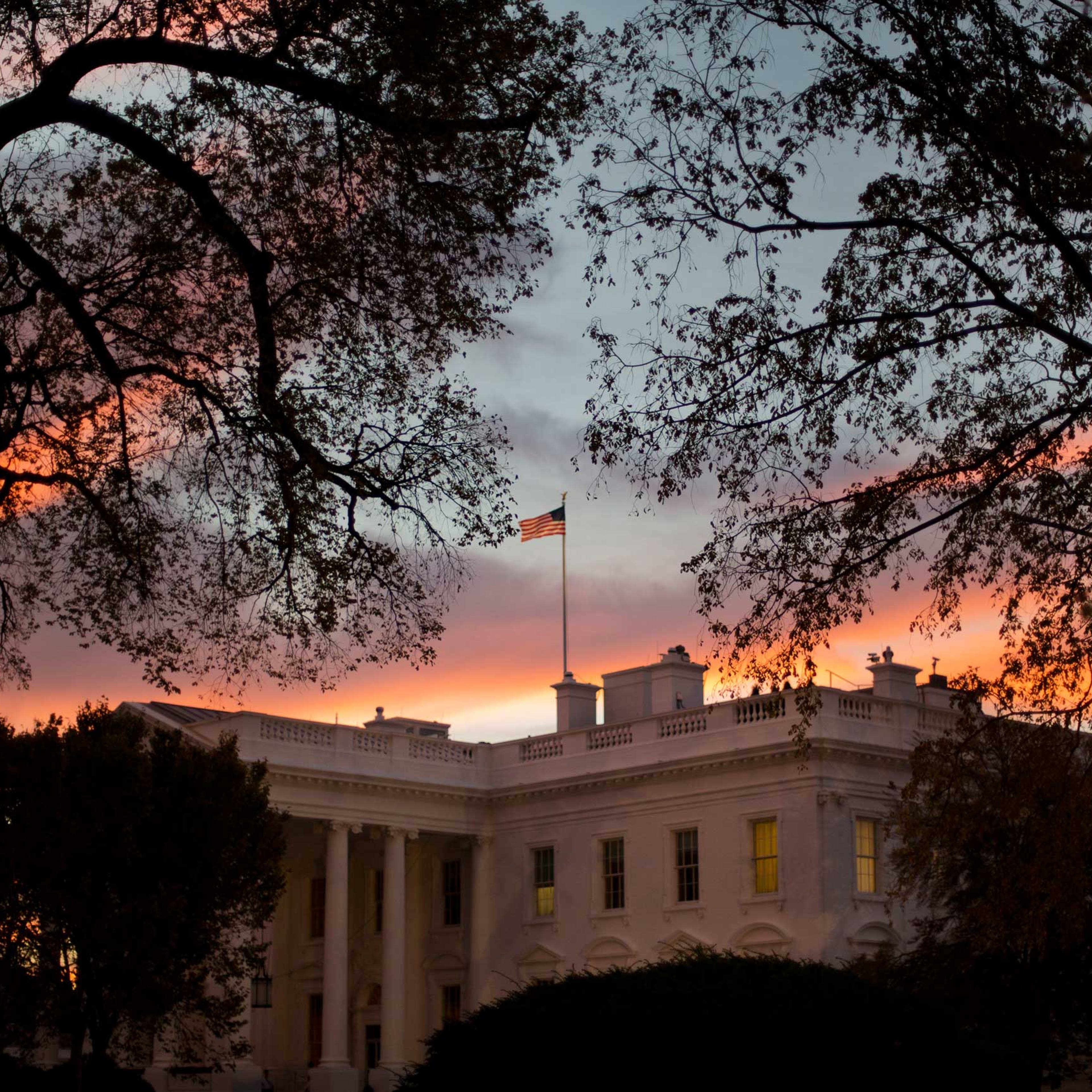 Early morning sunrise is seen over the White House in Washington, Oct. 28, 2014.