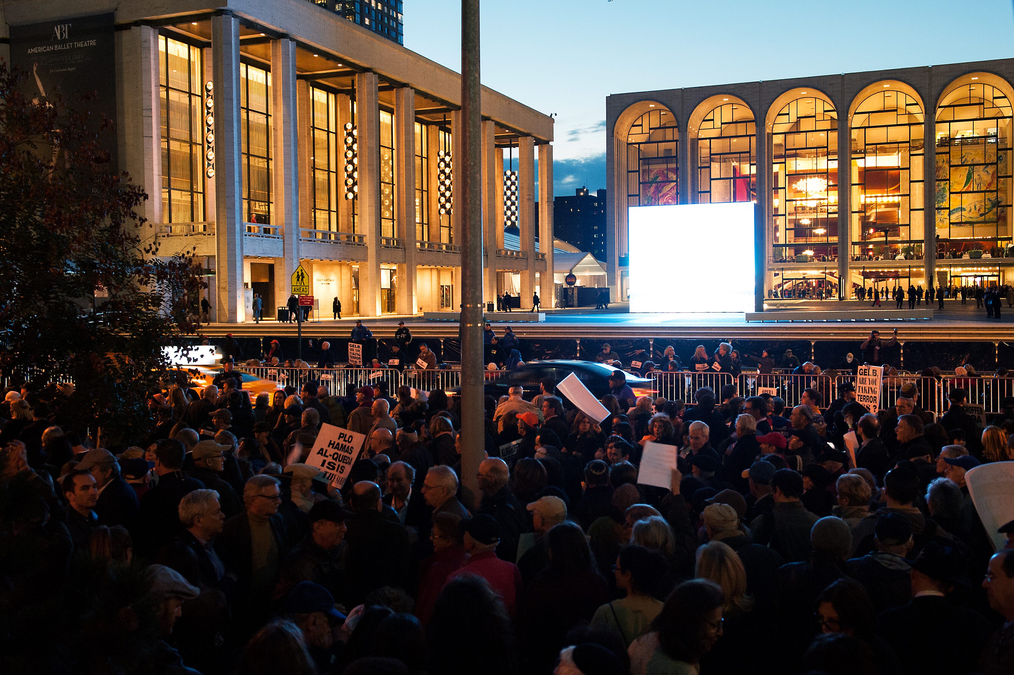 Protestors hold signs outside the Metropolitan Opera at Lincoln Center on opening night of the opera, "The Death of Klinghoffer" on October 20, 2014 in New York City. The opera has been accused of anti-Semitism and, at its opening tonight, demonstrators,