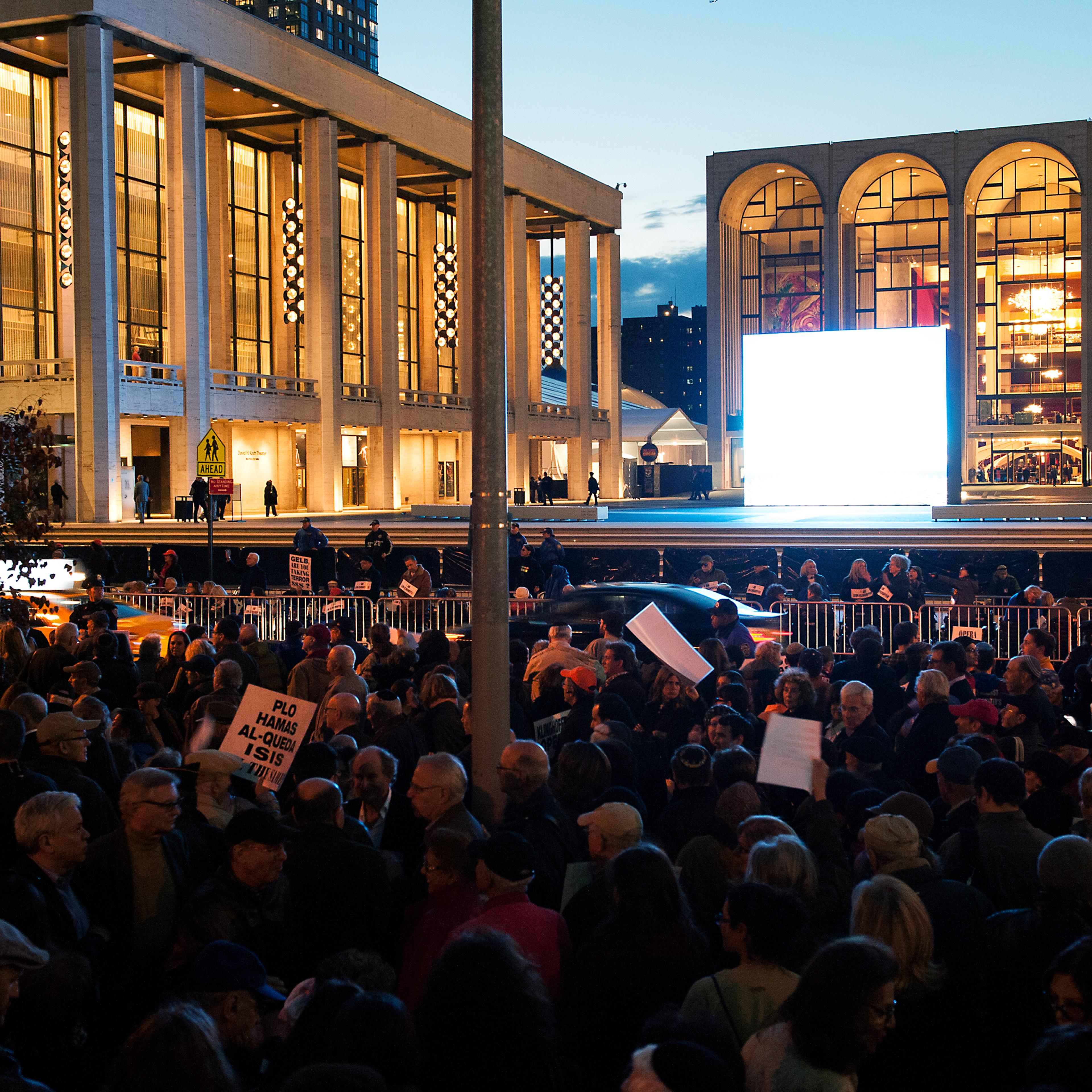 Protestors hold signs outside the Metropolitan Opera at Lincoln Center on opening night of the opera, "The Death of Klinghoffer" on October 20, 2014 in New York City. The opera has been accused of anti-Semitism and, at its opening tonight, demonstrators,