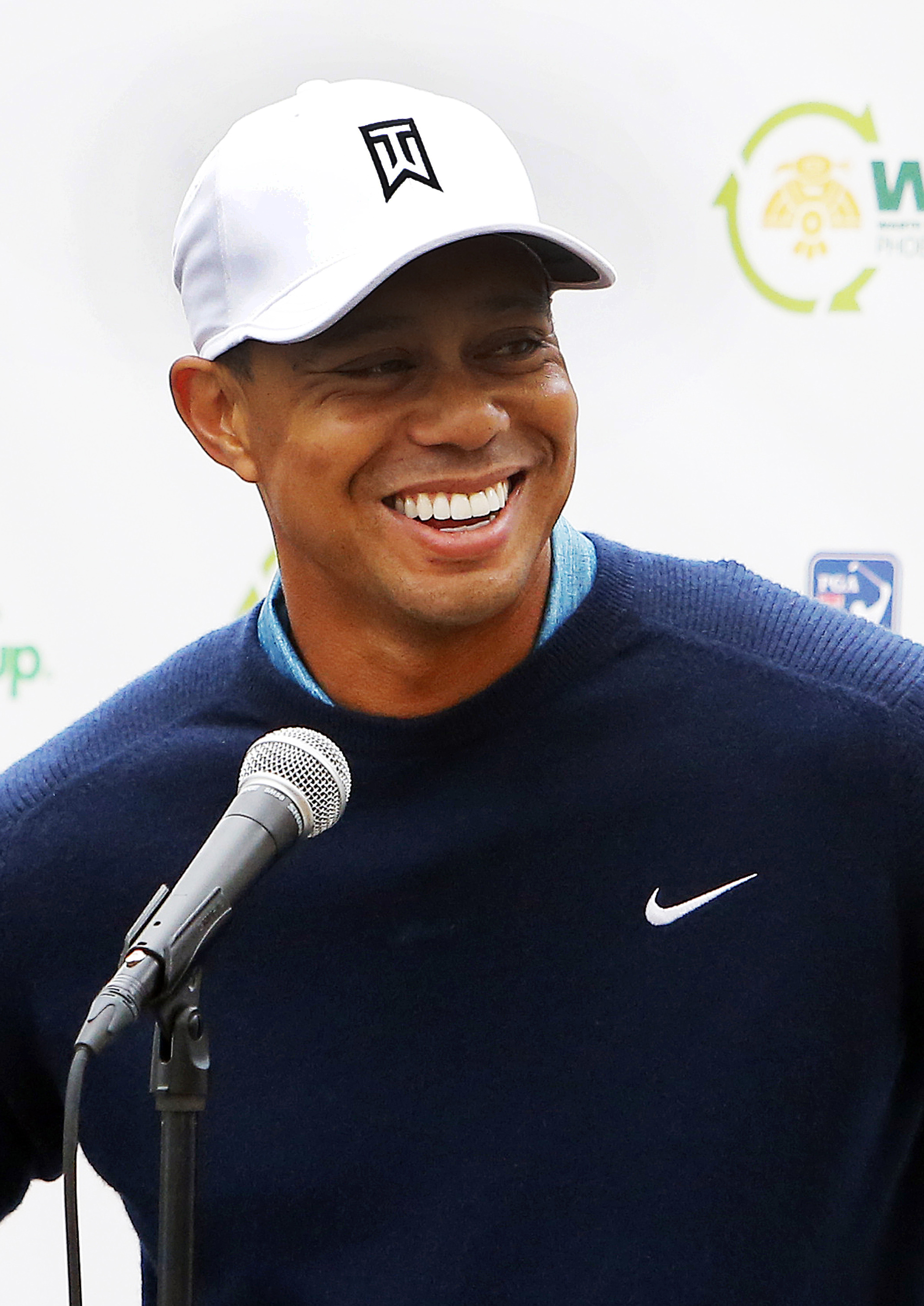 Tiger Woods talks to the media in Scottsdale, Ariz. on Jan. 27, 2015.