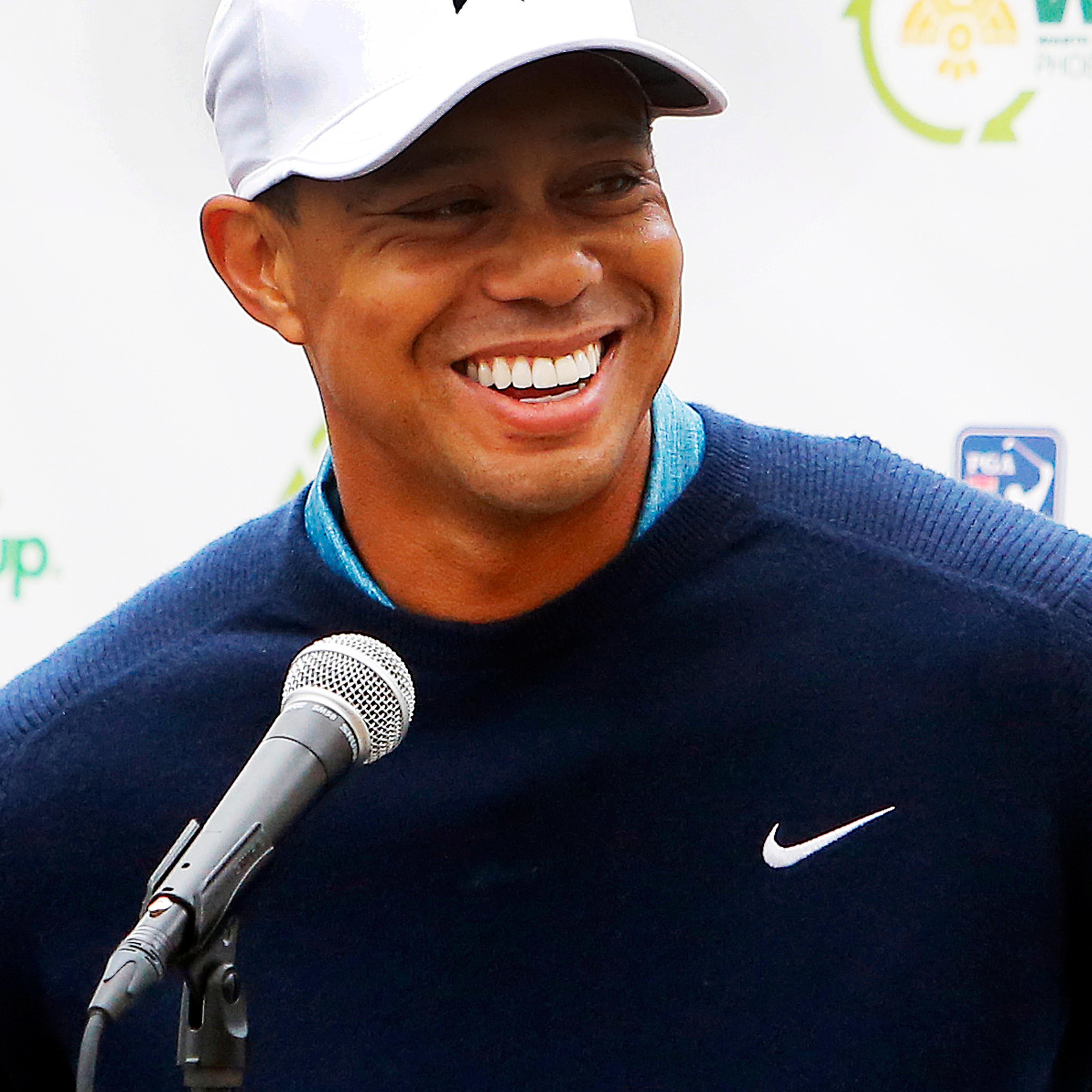 Tiger Woods talks to the media in Scottsdale, Ariz. on Jan. 27, 2015.