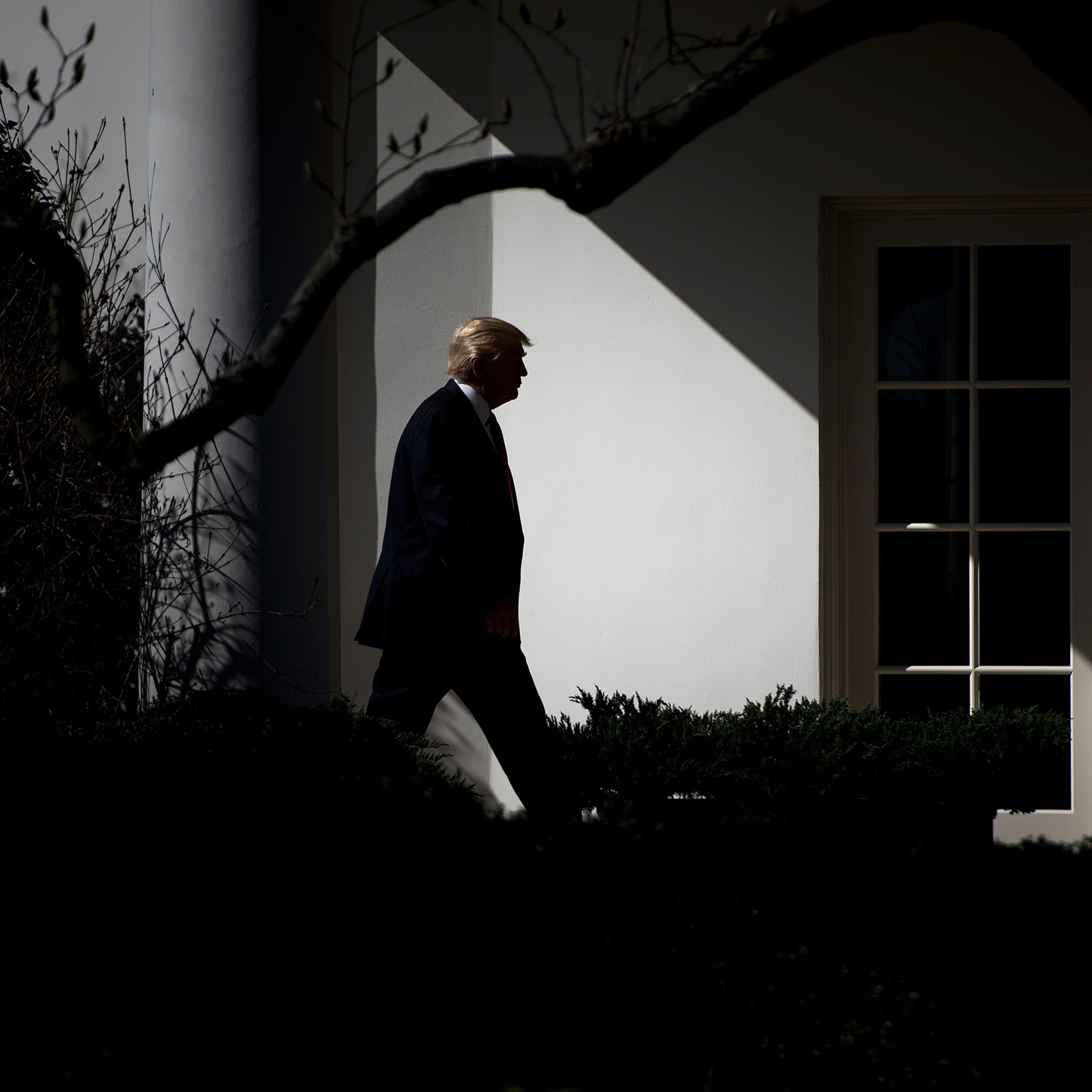 US President Donald Trump walks from Marine One to the White House February 24, 2017 in Washington, DC.