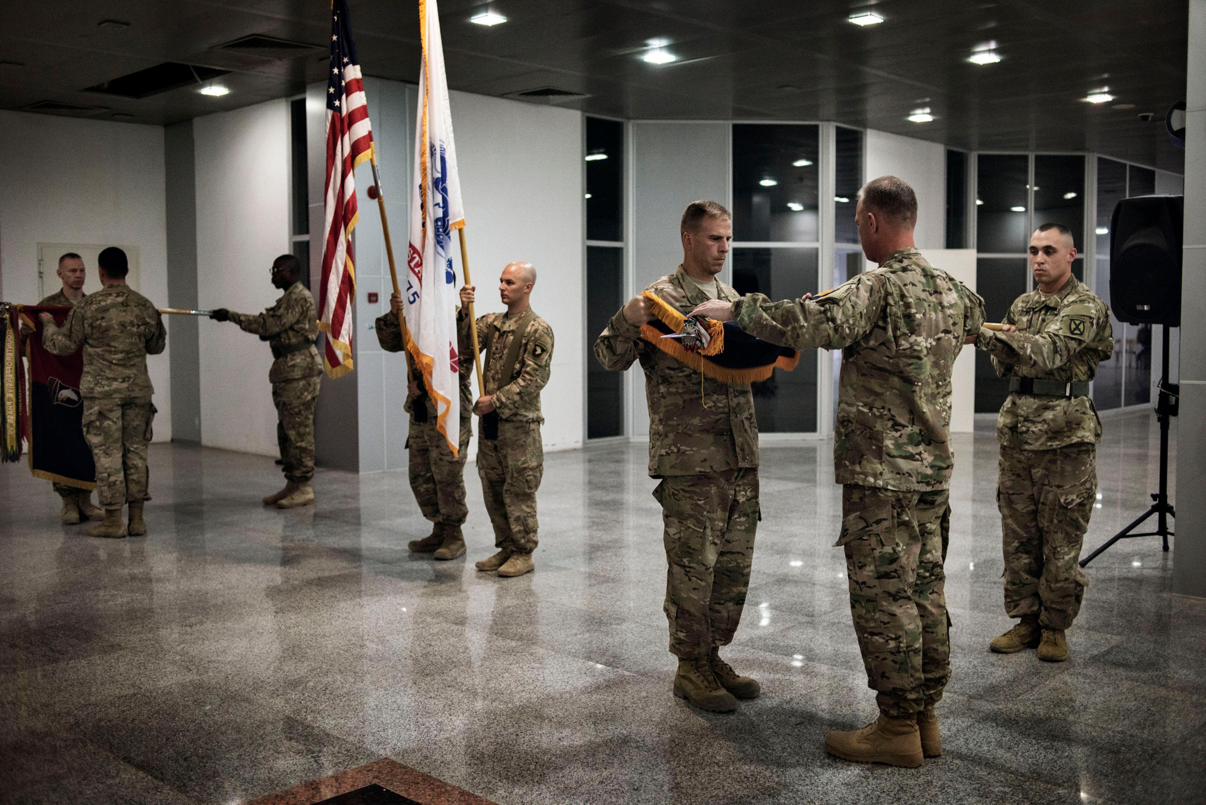 U.S. Officers and soldiers from the U.S. military, Iraqi armed forces, and Kurdish forces, participate in a U.S. transfer of authority ceremony in Erbil, in northern Iraq's semi-autonomous Kurdish region, May 17, 2016.