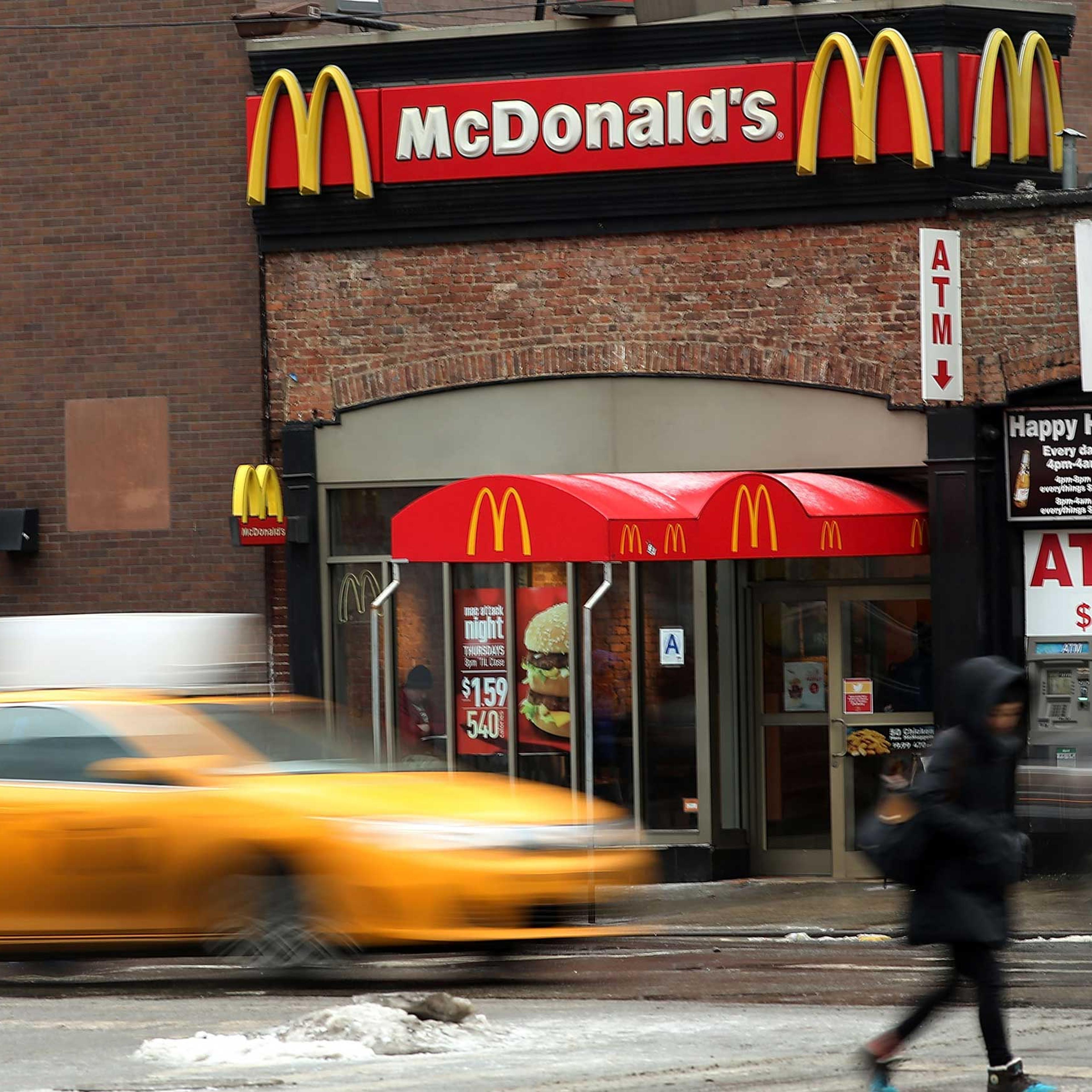 Cars move past a McDonald's in lower Manhattan on February 9, 2015 in New York City.