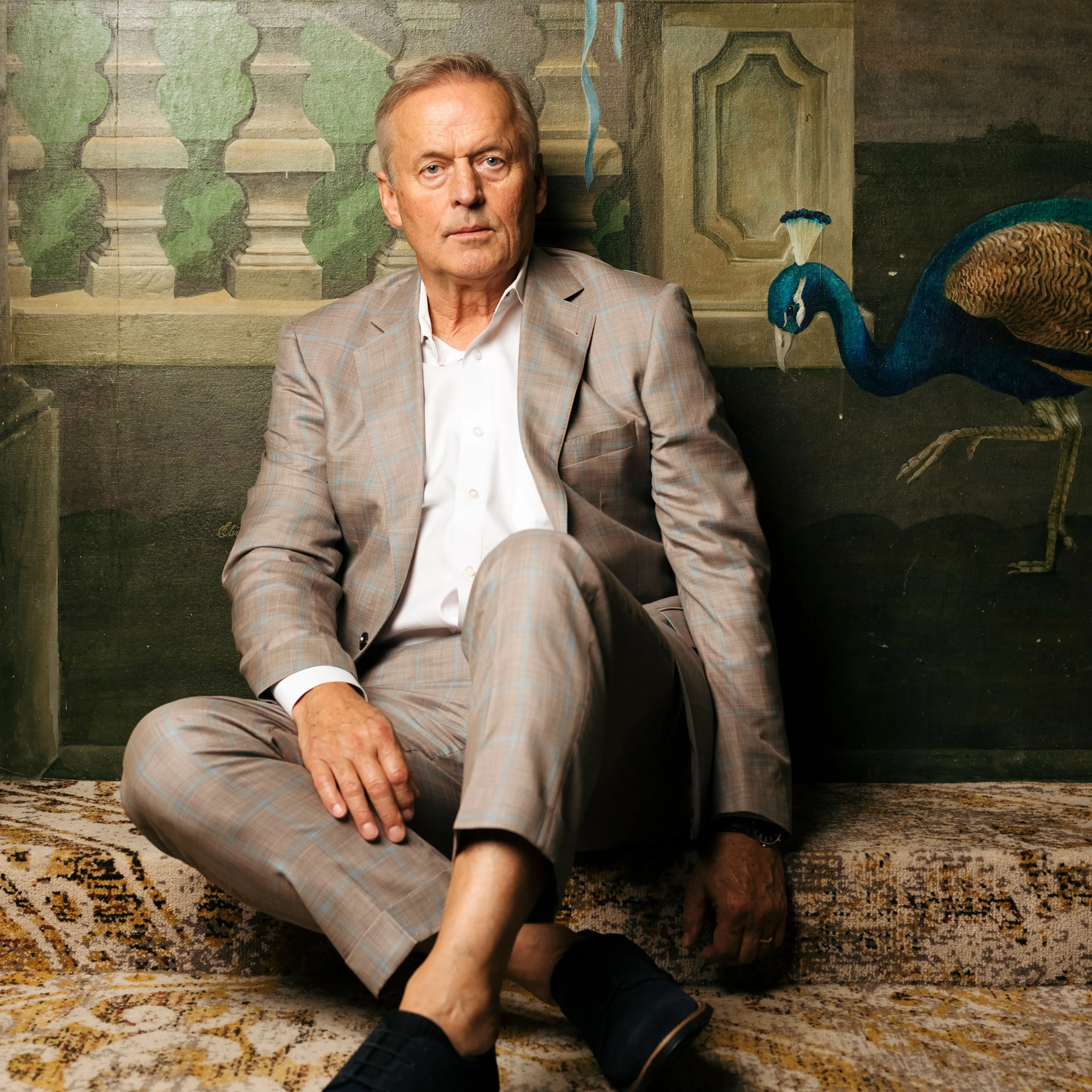 John Grisham sitting at the Peabody Hotel in Memphis