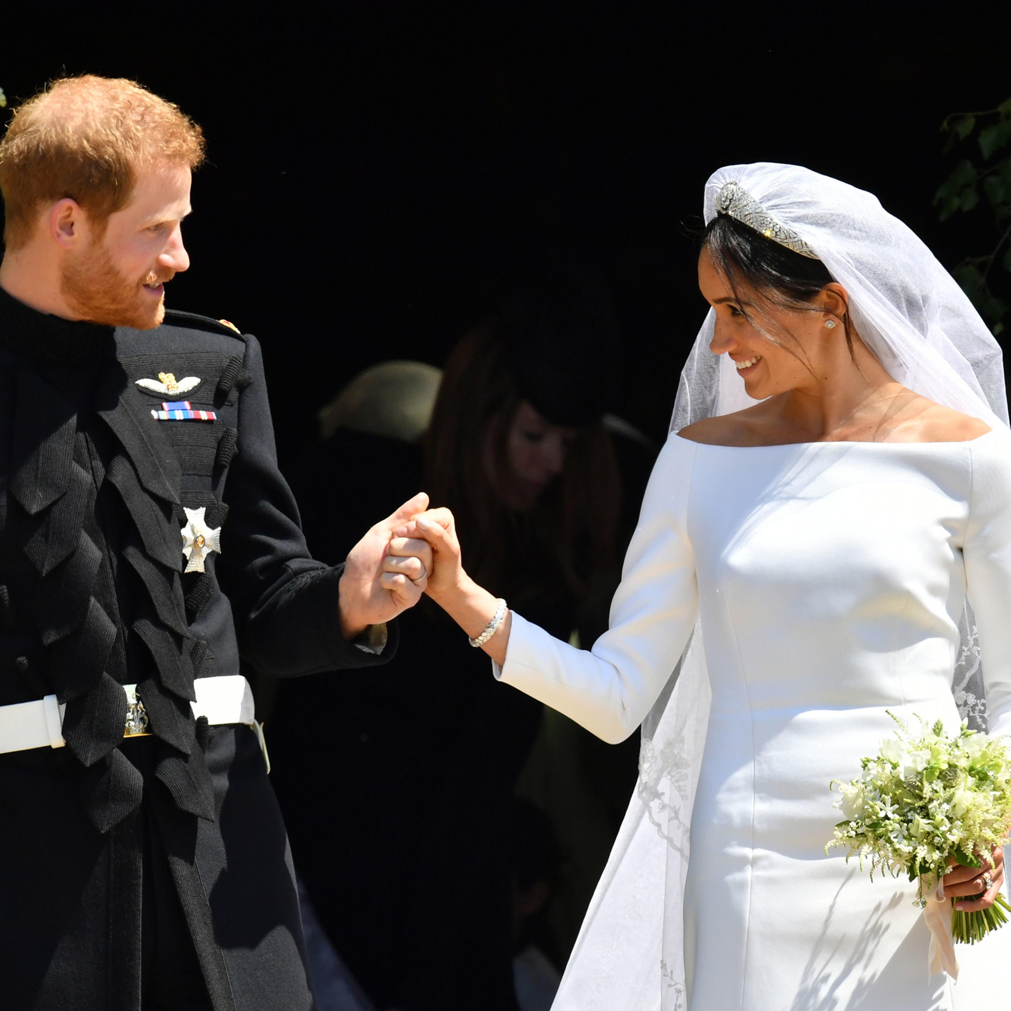 Prince Harry and Meghan Markle depart St George's Chapel in Windsor Castle after their wedding, May 19, 2018.