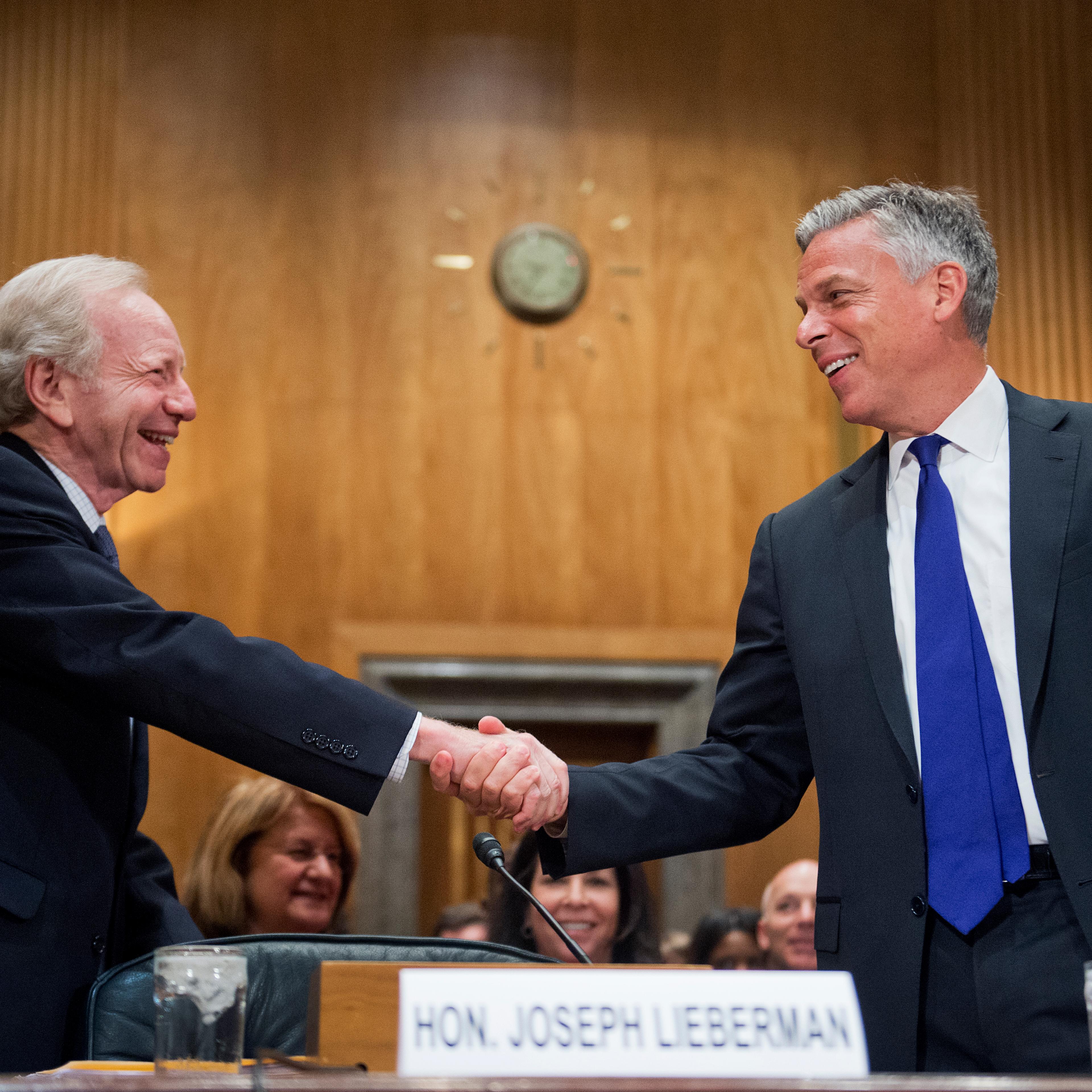 Former Sen. Joseph Lieberman, I-Conn., left, and former Gov. Jon Huntsman Jr., R-Utah, co-chairs of No Labels, arrive for a Senate Homeland Security and Governmental Affairs Committee hearing on June 17, 2015.