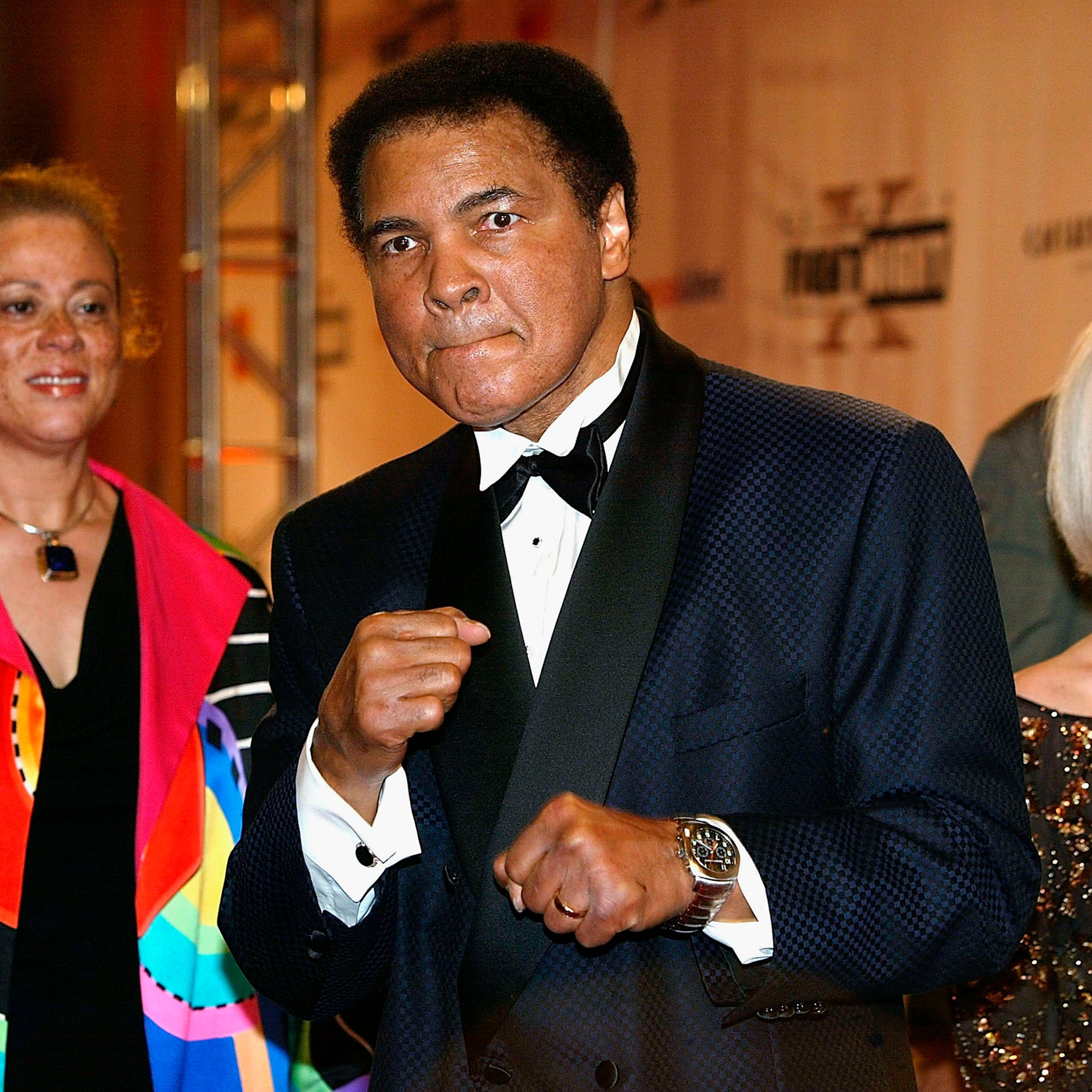 Muhammad Ali and wife Lonnie Ali arrive at 'Celebrity Fight Night X', a charity event to raise money for the Muhammad Ali Parkinson Research Center at Barrow Neurological Institute in Phoenix, Arizona on March 27, 2004.