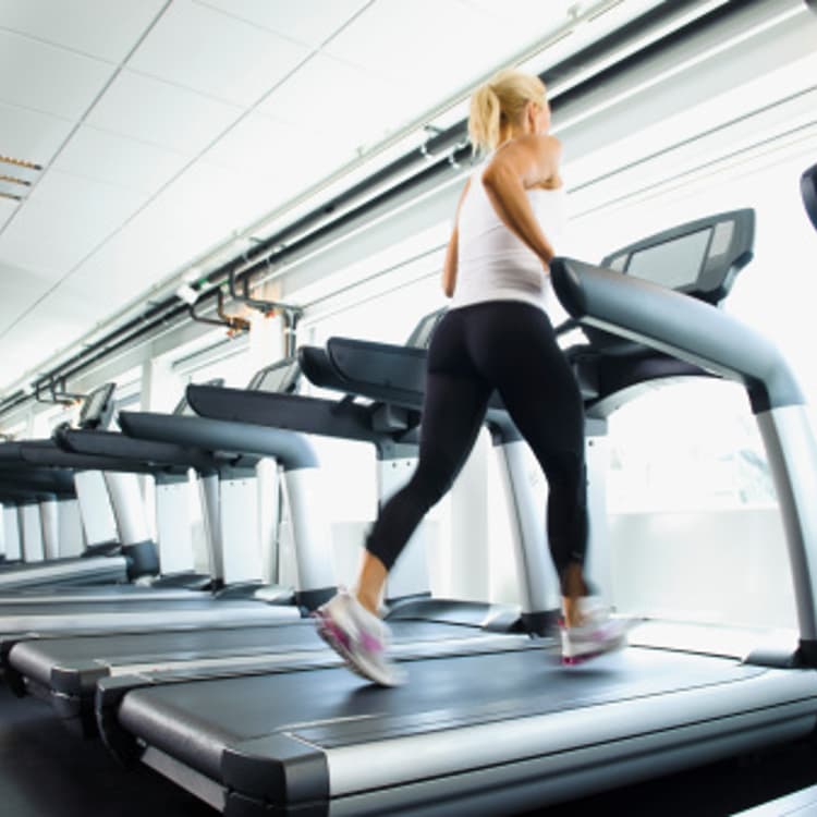 woman-running-treadmill-gym