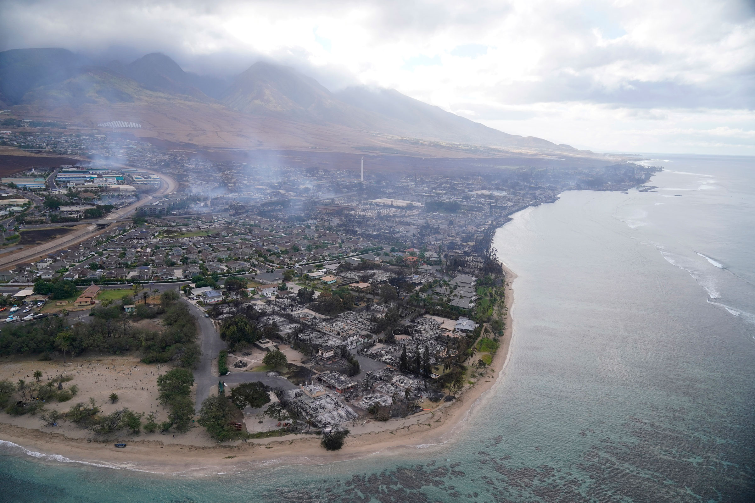 burned out homes and obliterated communities are left in Lahaina, Hawaii