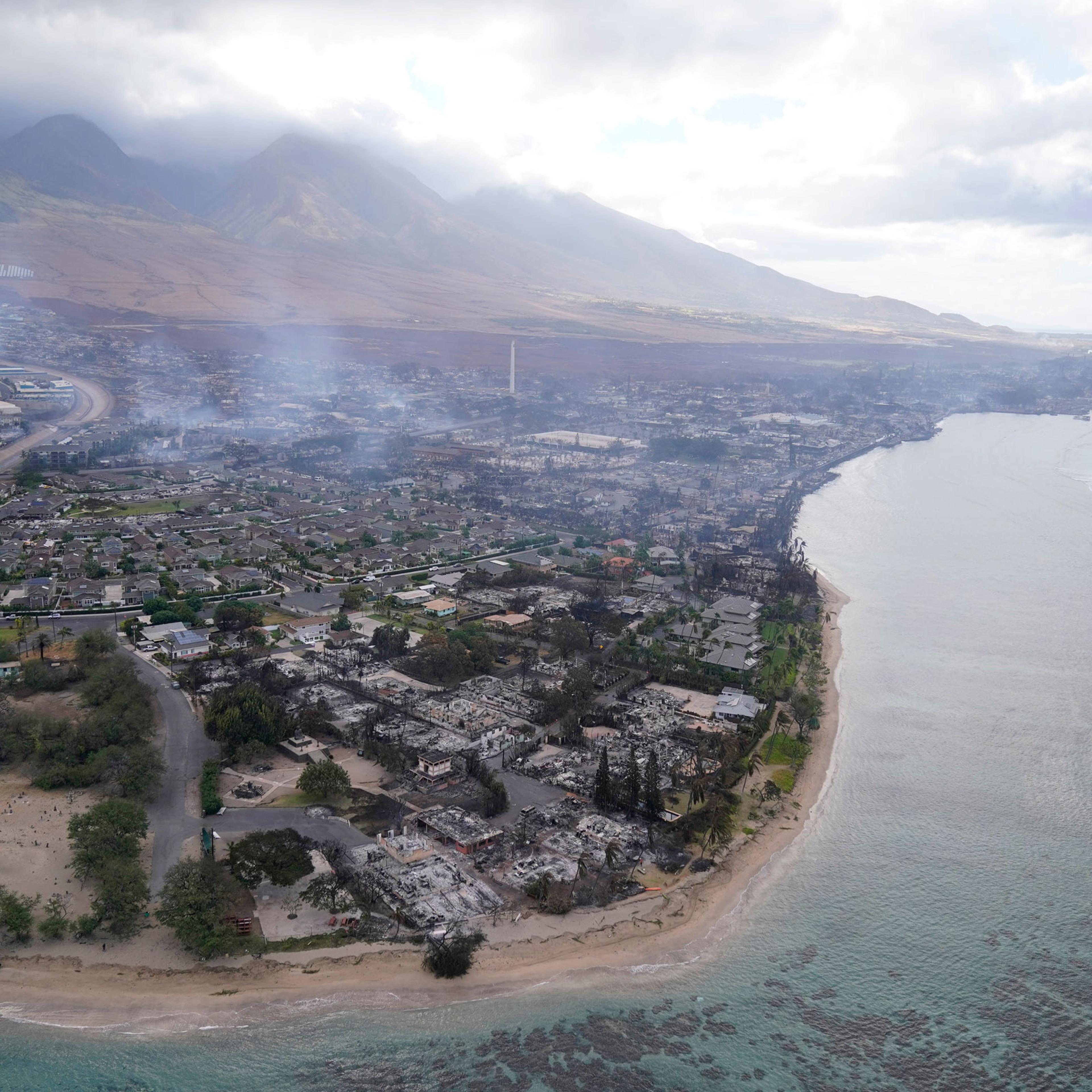 burned out homes and obliterated communities are left in Lahaina, Hawaii