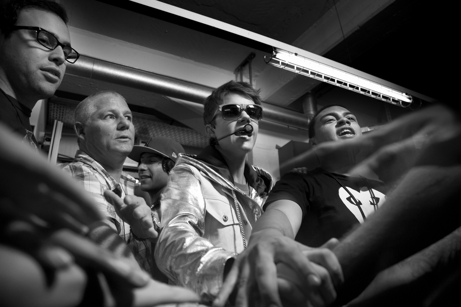 Justin and his crew get psyched backstage just before a concert begins in Zurich, Switzerland's Hallen Stadium. April 8, 2011<br>
<br>
<b>More on Time.com:</b> <a href="http://www.time.com/time/photogallery/0,29307,2066373,00.html">Photos: Rain, South Korea's Unstoppable Pop Superstar</a>