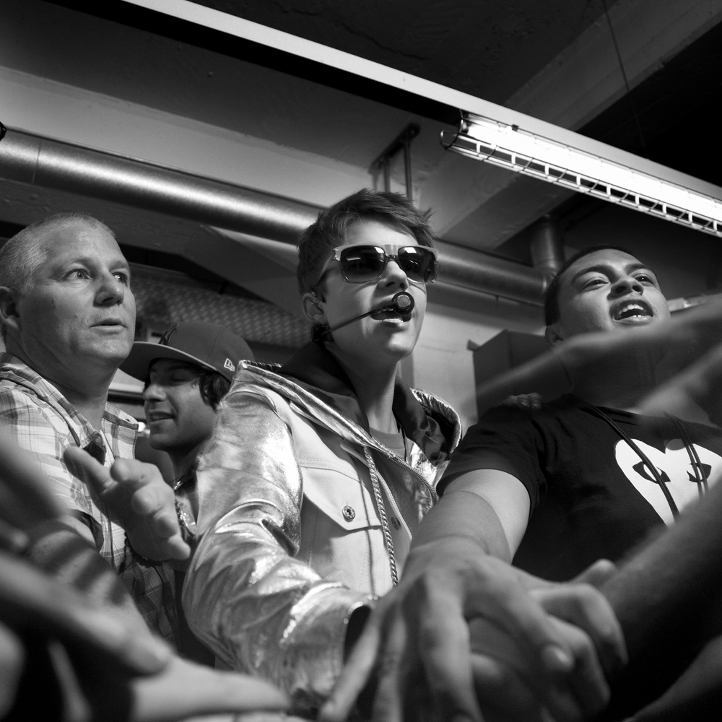 Justin and his crew get psyched backstage just before a concert begins in Zurich, Switzerland's Hallen Stadium. April 8, 2011<br>
<br>
<b>More on Time.com:</b> <a href="http://www.time.com/time/photogallery/0,29307,2066373,00.html">Photos: Rain, South Korea's Unstoppable Pop Superstar</a>