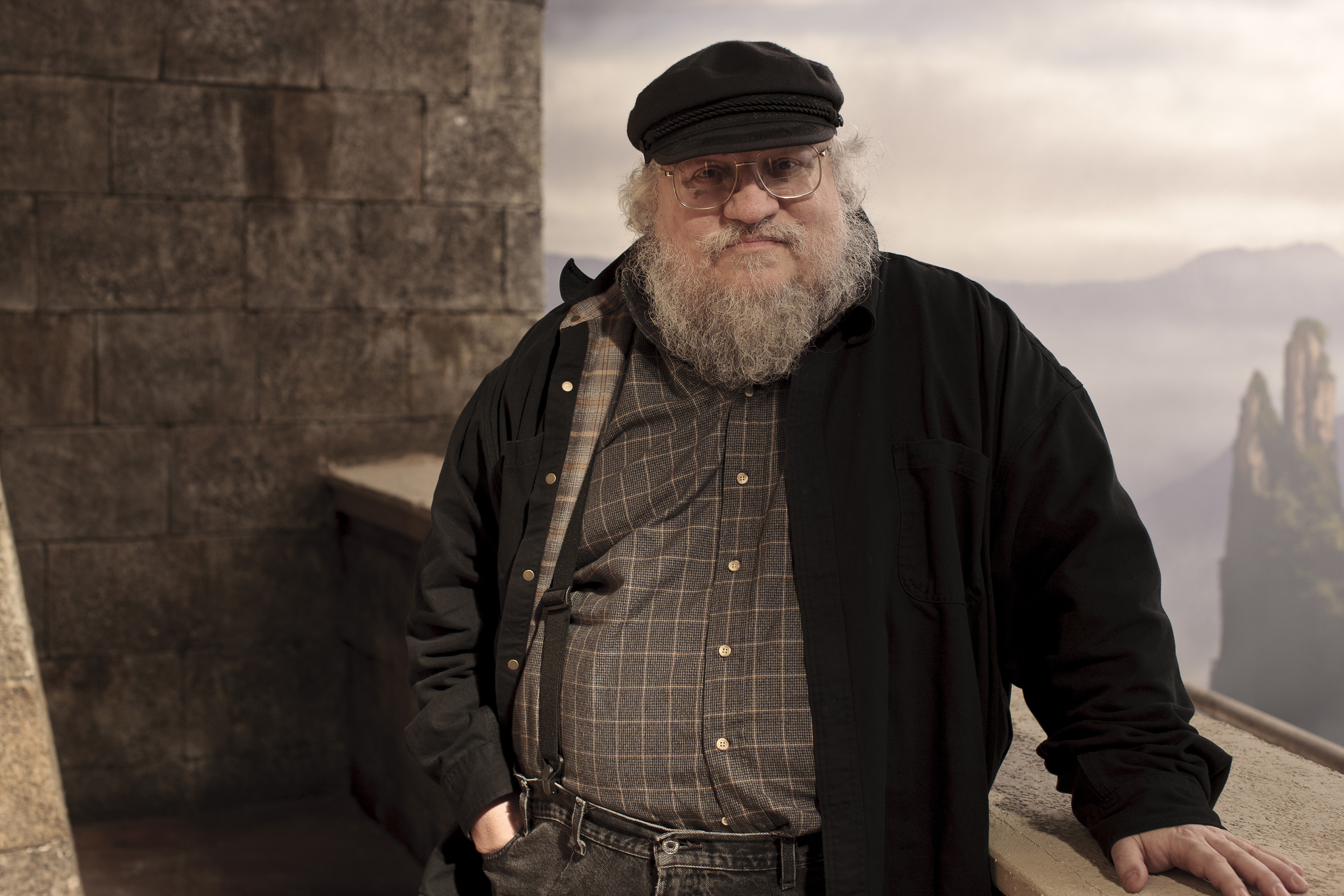 Author George R.R. Martin whose novel series has been adapted into the HBO series "Game of Thrones," is shown on the set.