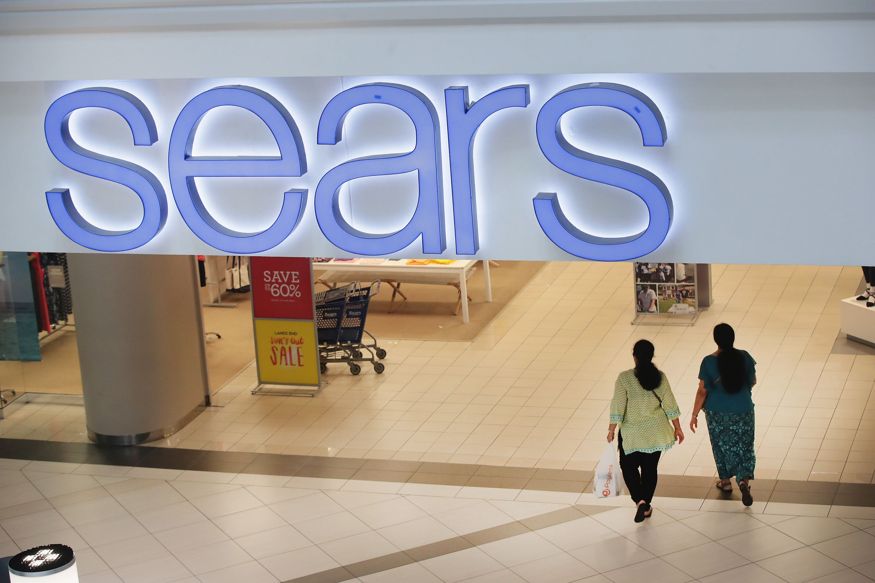 Car Drives Through Woodfield Mall