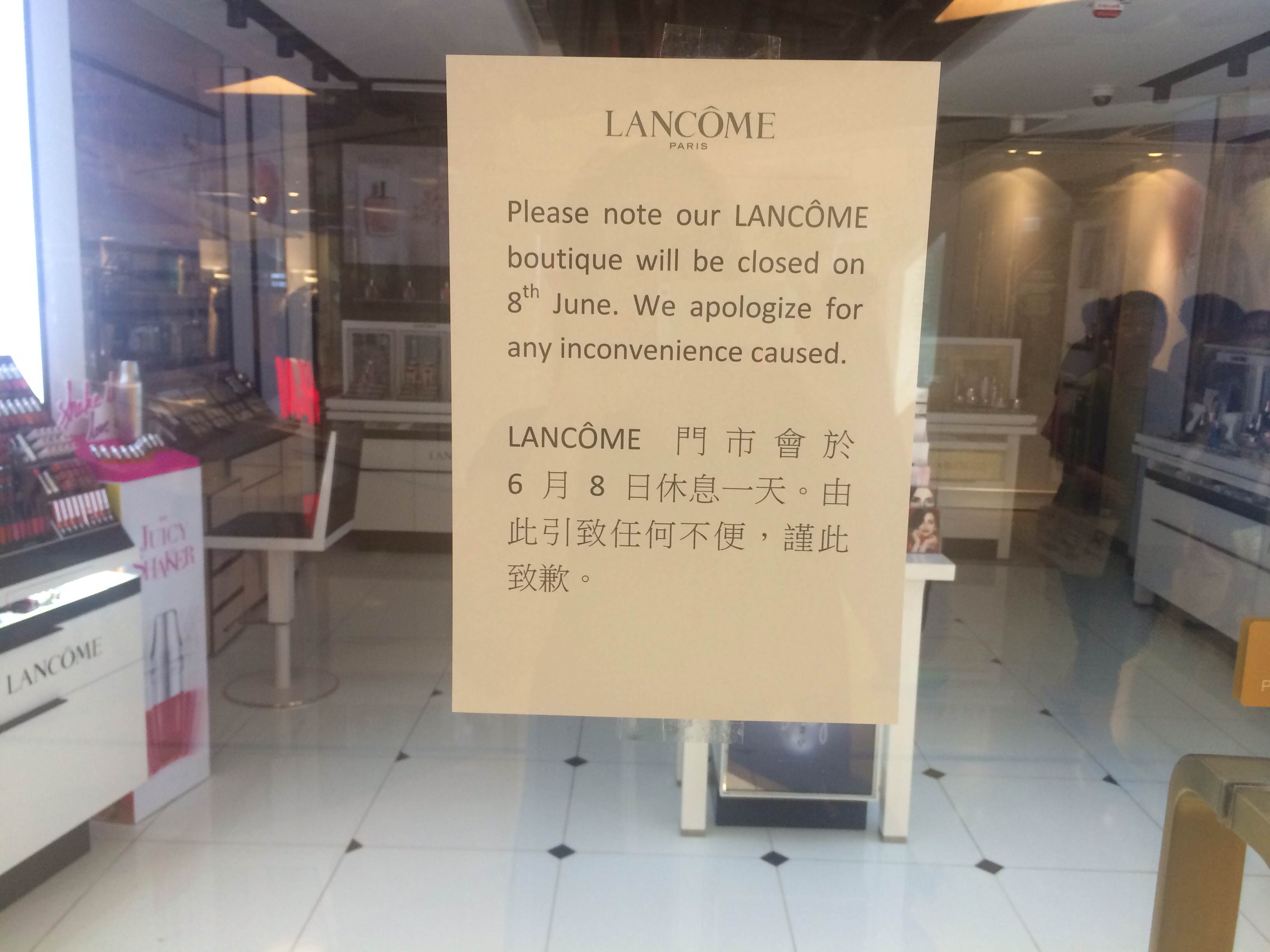A sign on the store doors of Lancome at Cityplaza in Hong Kong
