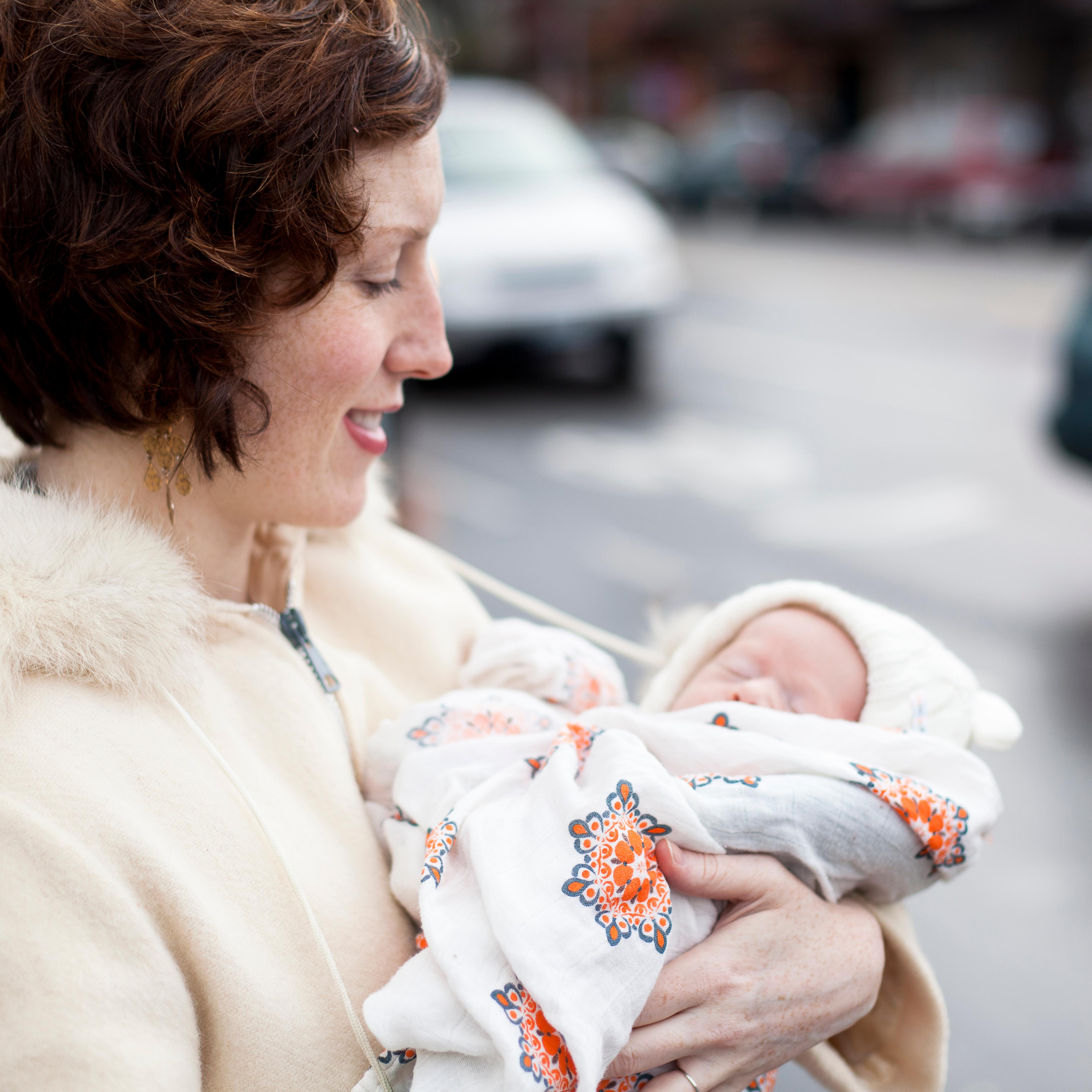 Woman and baby outside