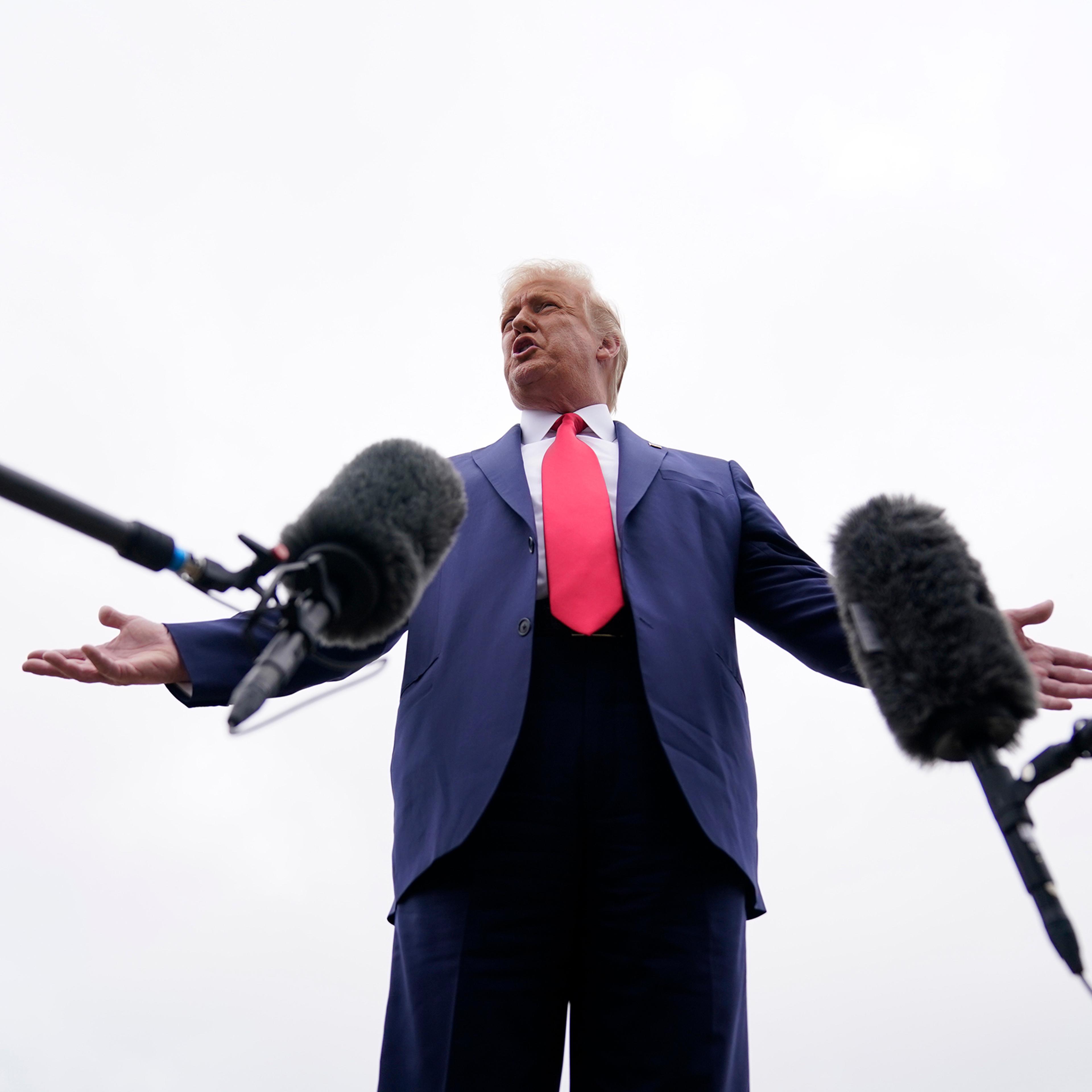 President Donald Trump speaks to the media in Andrews Air Force Base, Md., before boarding Air Force One for a trip to Kenosha, Wis., Sept. 1, 2020.