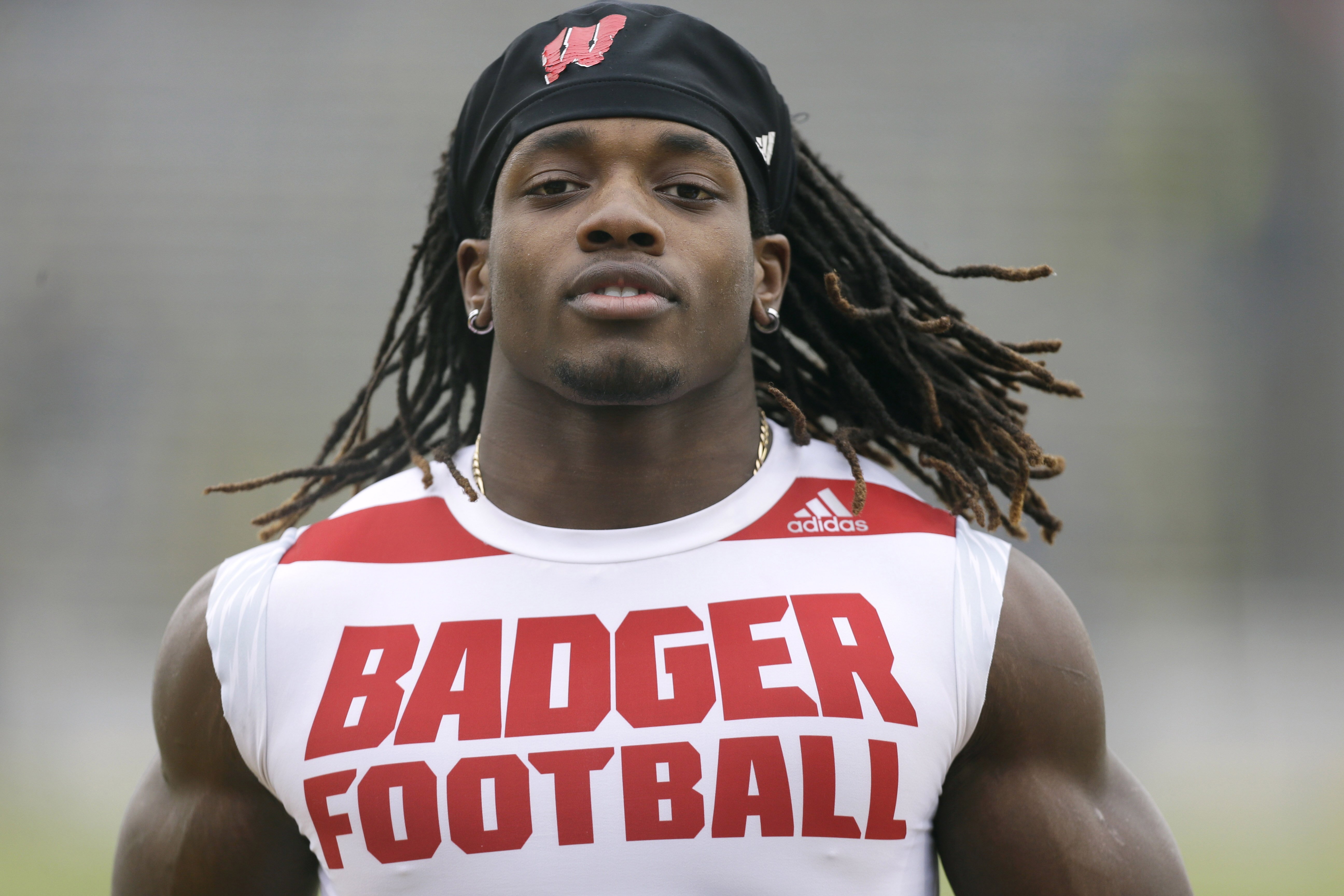 Wisconsin running back Melvin Gordon warming up on the field before an NCAA college football game against Iowa in Iowa City, Iowa.
