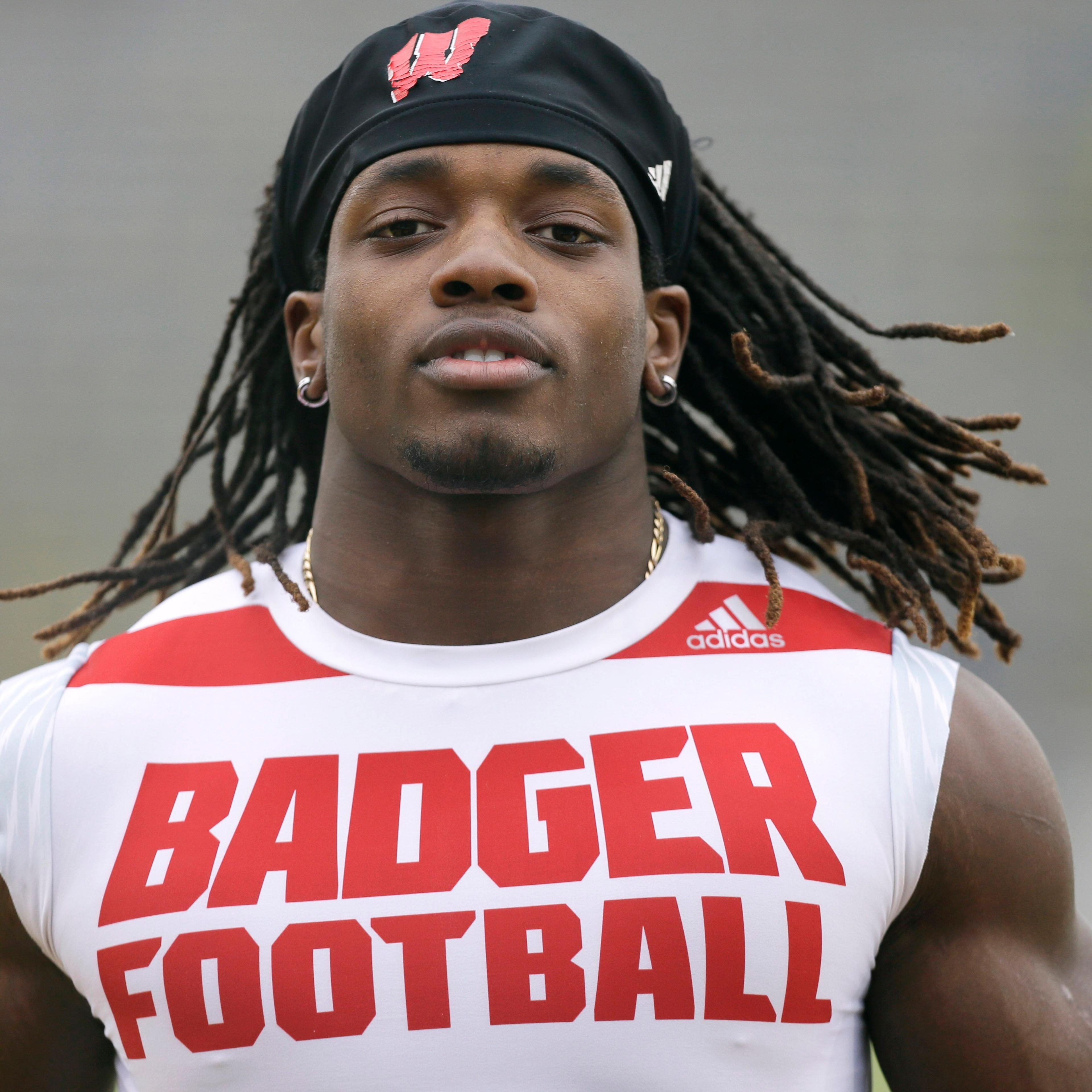 Wisconsin running back Melvin Gordon warming up on the field before an NCAA college football game against Iowa in Iowa City, Iowa.