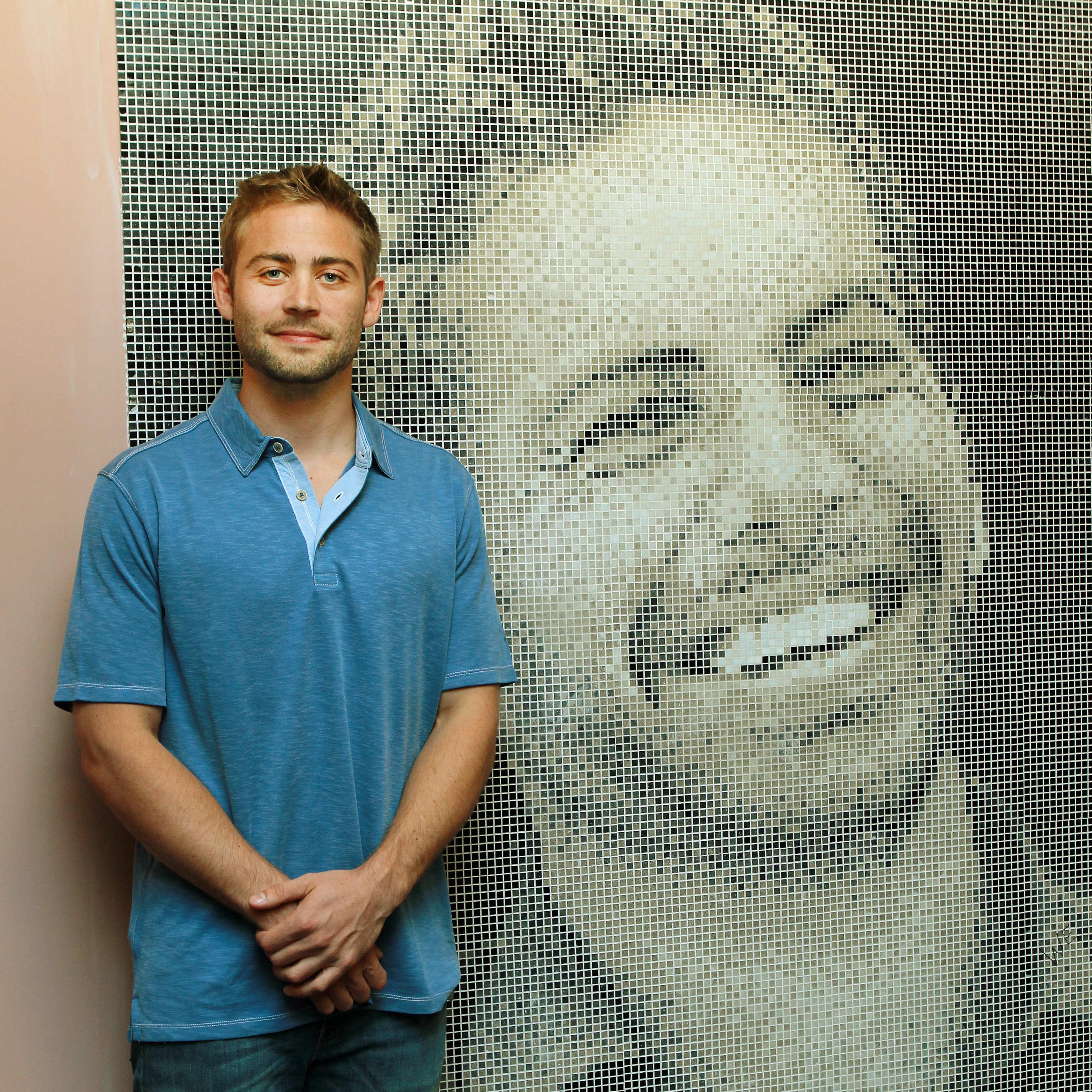 Cody Walker unveils a giant mosaic plaque dedicated to his late brother, American actor Paul Walker, at United Cinemas in Craigieburn, New South Wales