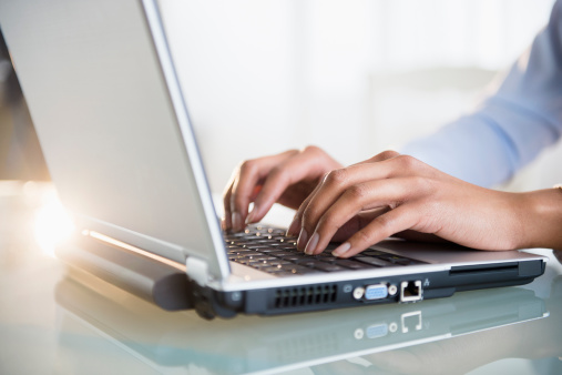 woman-typing-laptop