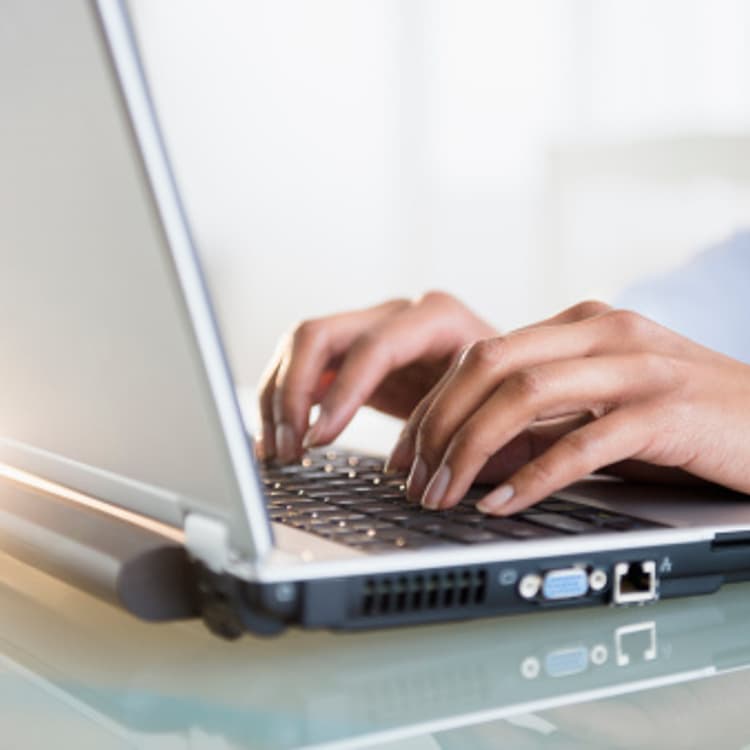 woman-typing-laptop
