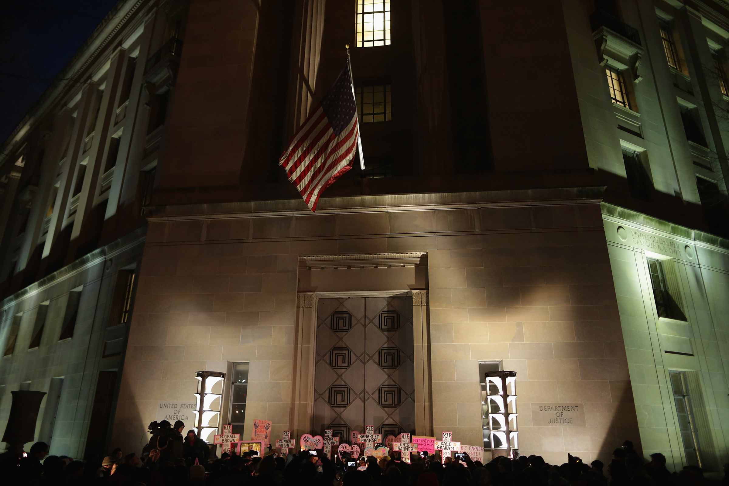 Code Pink for Peace and Mothers Against Police Brutality organize a protest outside the Justice Department, joining mothers whose unarmed sons where killed by police and other demonstrators in Washington, D.C. on Dec. 10, 2014.