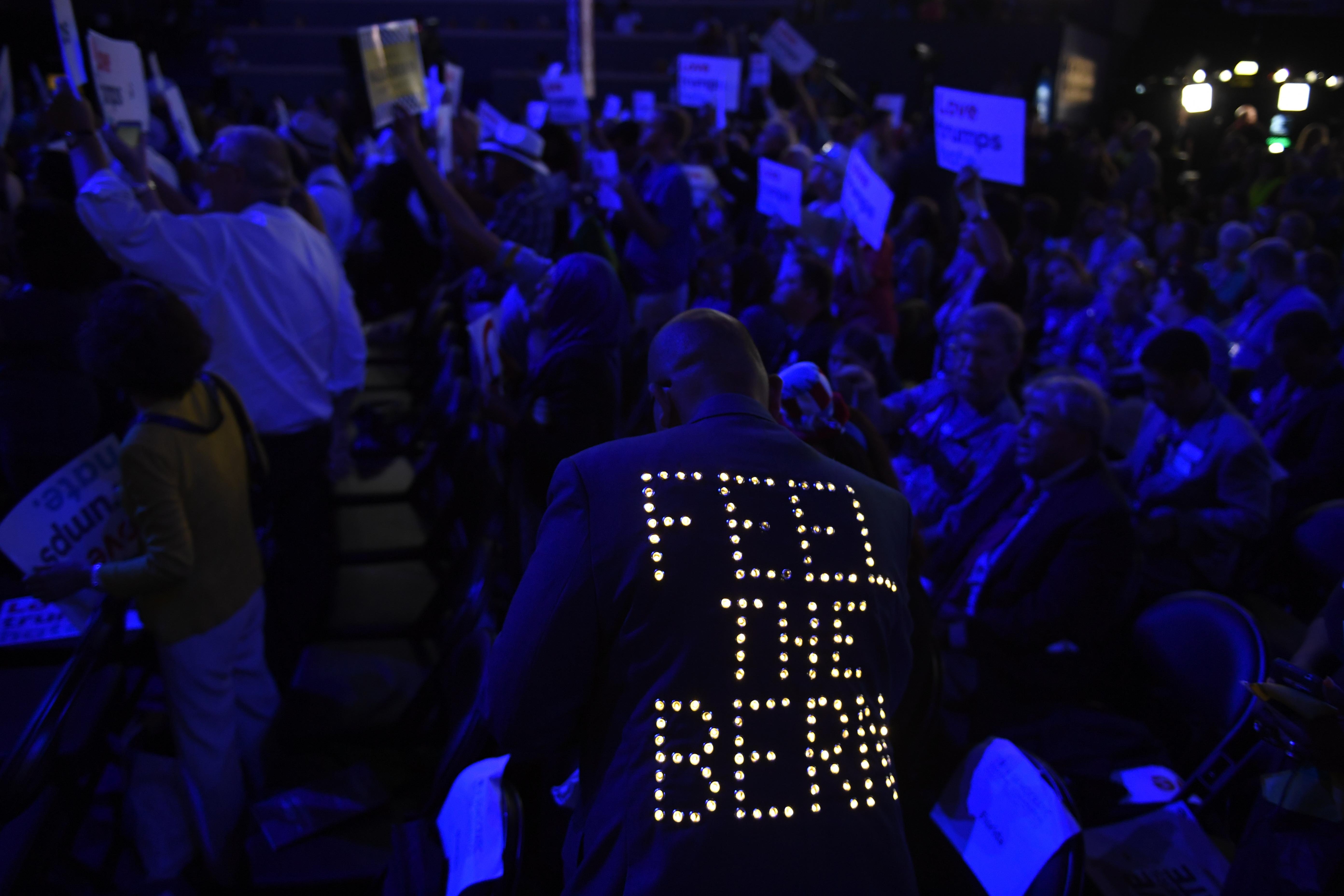A supporter of Bernie Sanders wears a sequined jacket during the 2016 Democratic National Convention at Wells Fargo Arena.