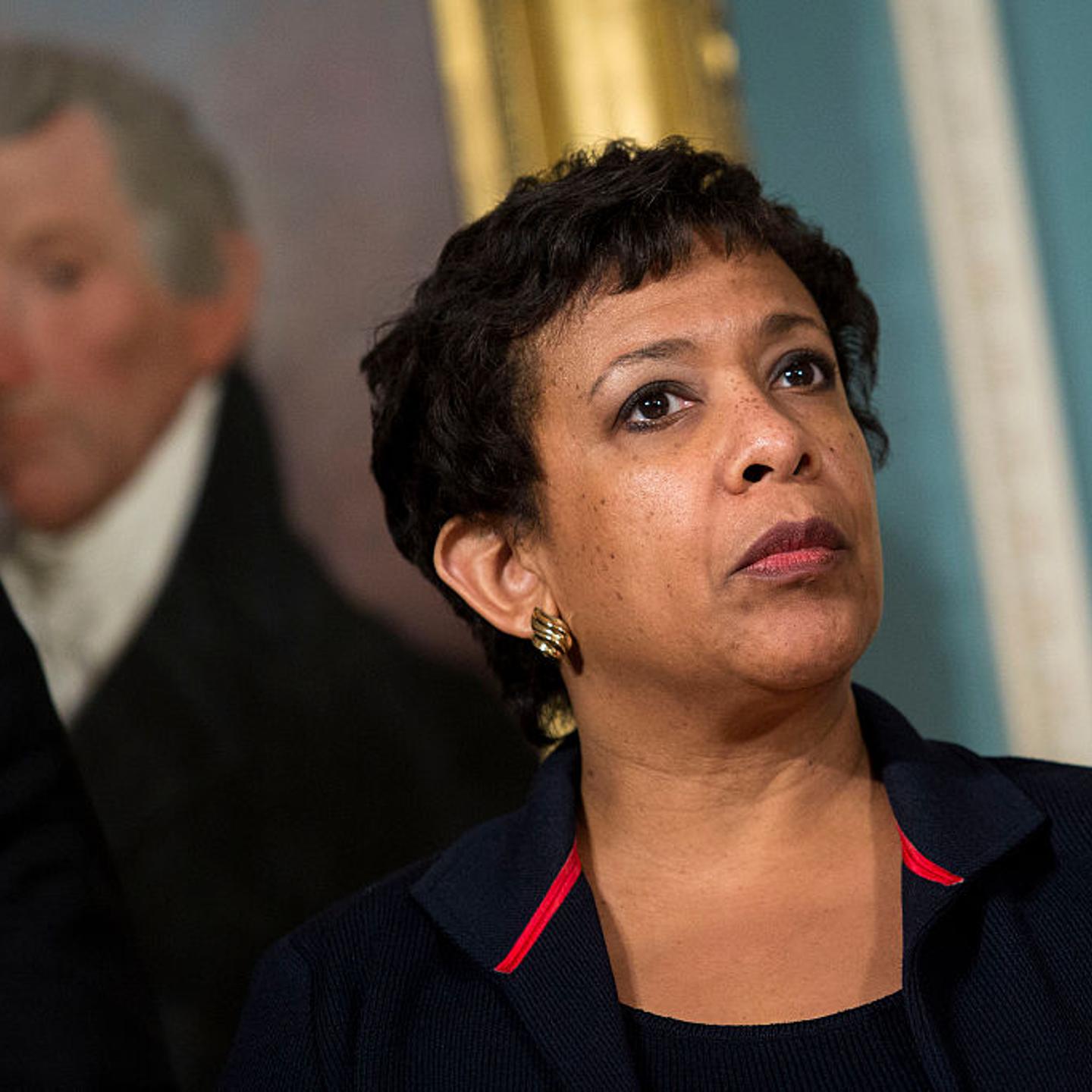 Attorney General Loretta Lynch looks on as President Barack Obama makes a statement after meeting with his National Security Council at the State Department on Feb. 25, 2016 in Washington, DC.