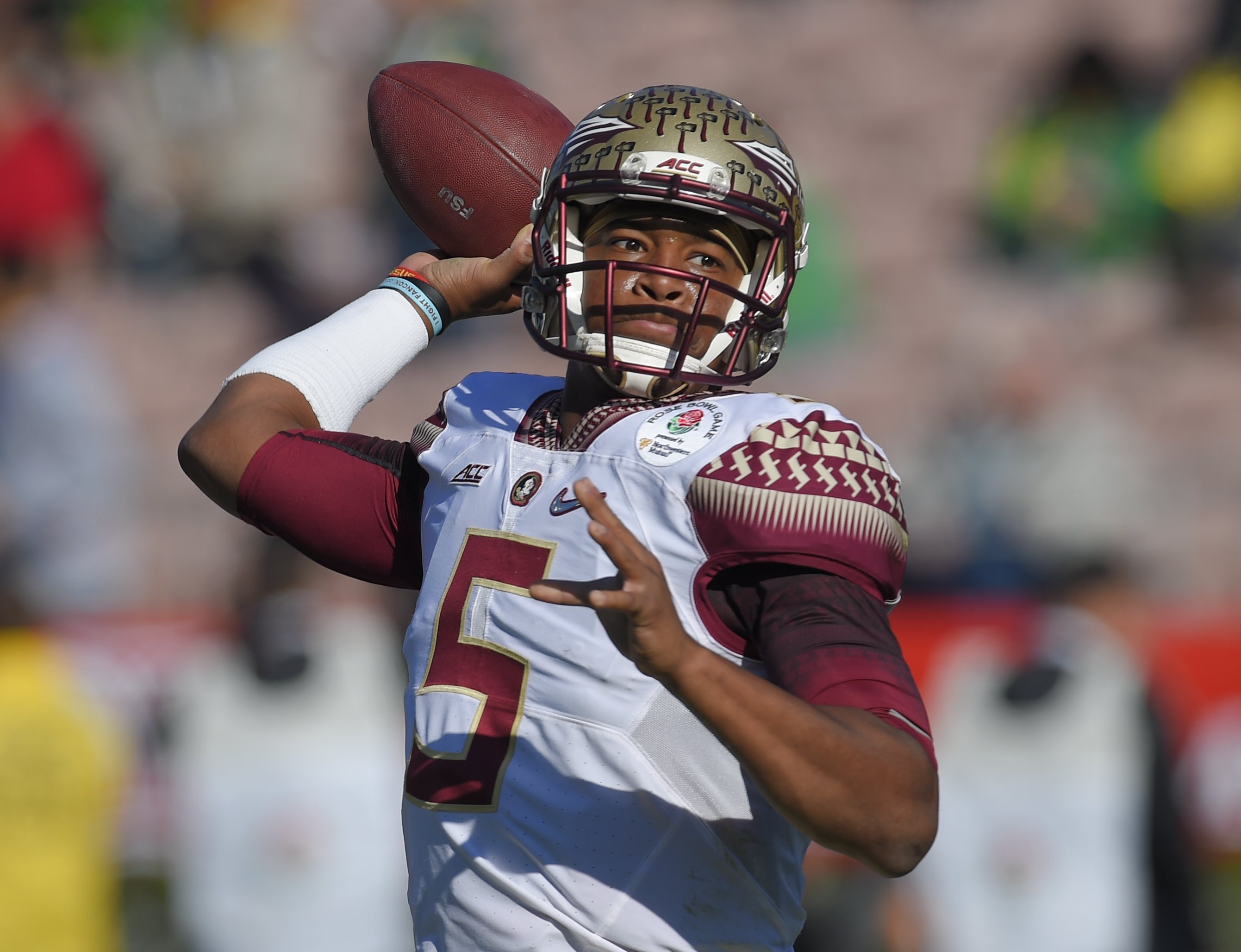 Quarterback Jameis Winston passes against Oregon during the first half of the Rose Bowl NCAA college football playoff semifinal, in Pasadena, Calif. on Jan. 1, 2015.