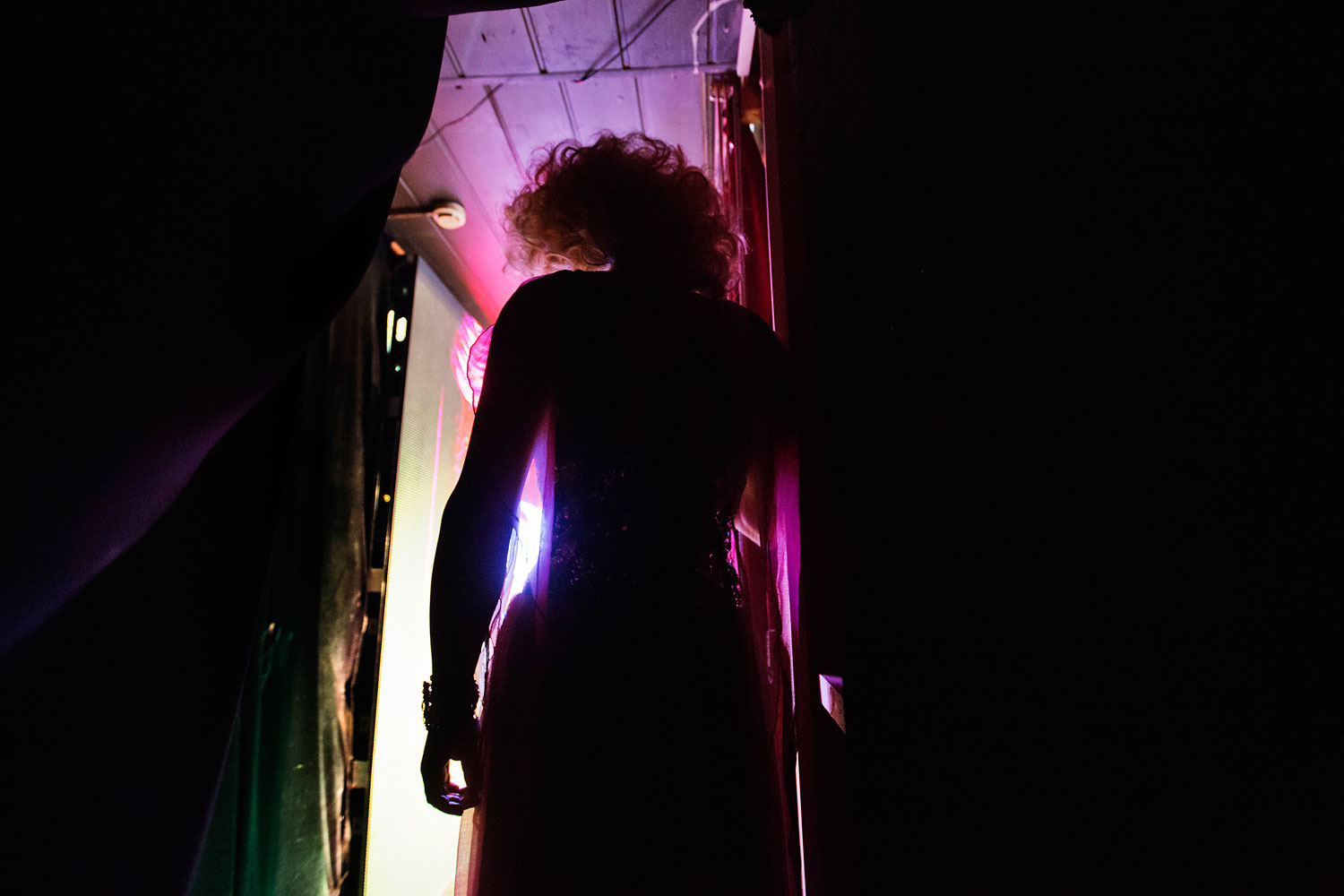 Penelopa, who would only give his stage name, steps out on stage for a performance at the Mayak cabaret in Sochi, Feb. 8, 2014.