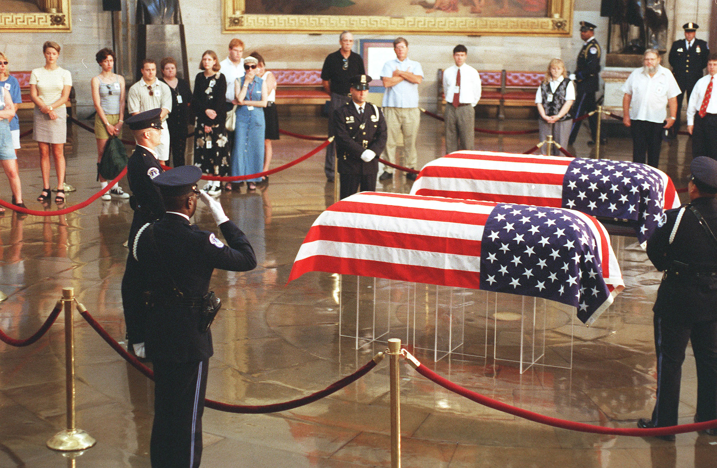 U.S. Capitol Police Honor Guard move away after being relieved from standing at the caskets of slain U.S. Capitol Police officers John Gibson and Jacob J. Chestnut as they lay in honor at the Rotunda.