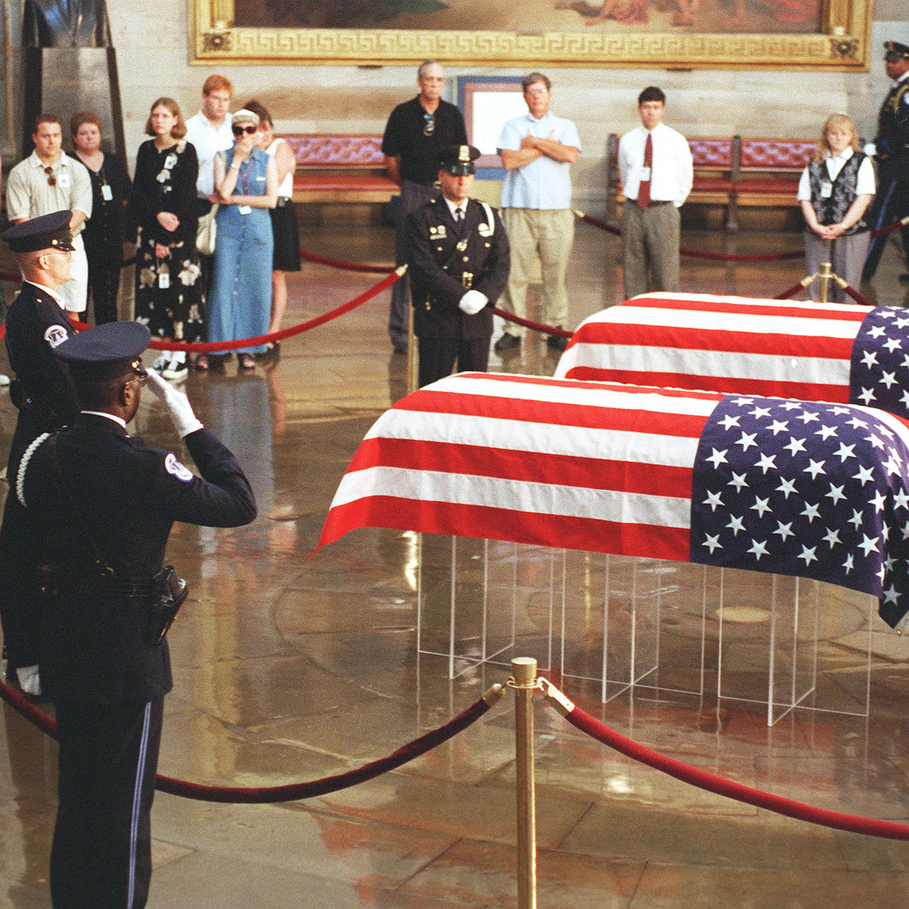 U.S. Capitol Police Honor Guard move away after being relieved from standing at the caskets of slain U.S. Capitol Police officers John Gibson and Jacob J. Chestnut as they lay in honor at the Rotunda.
