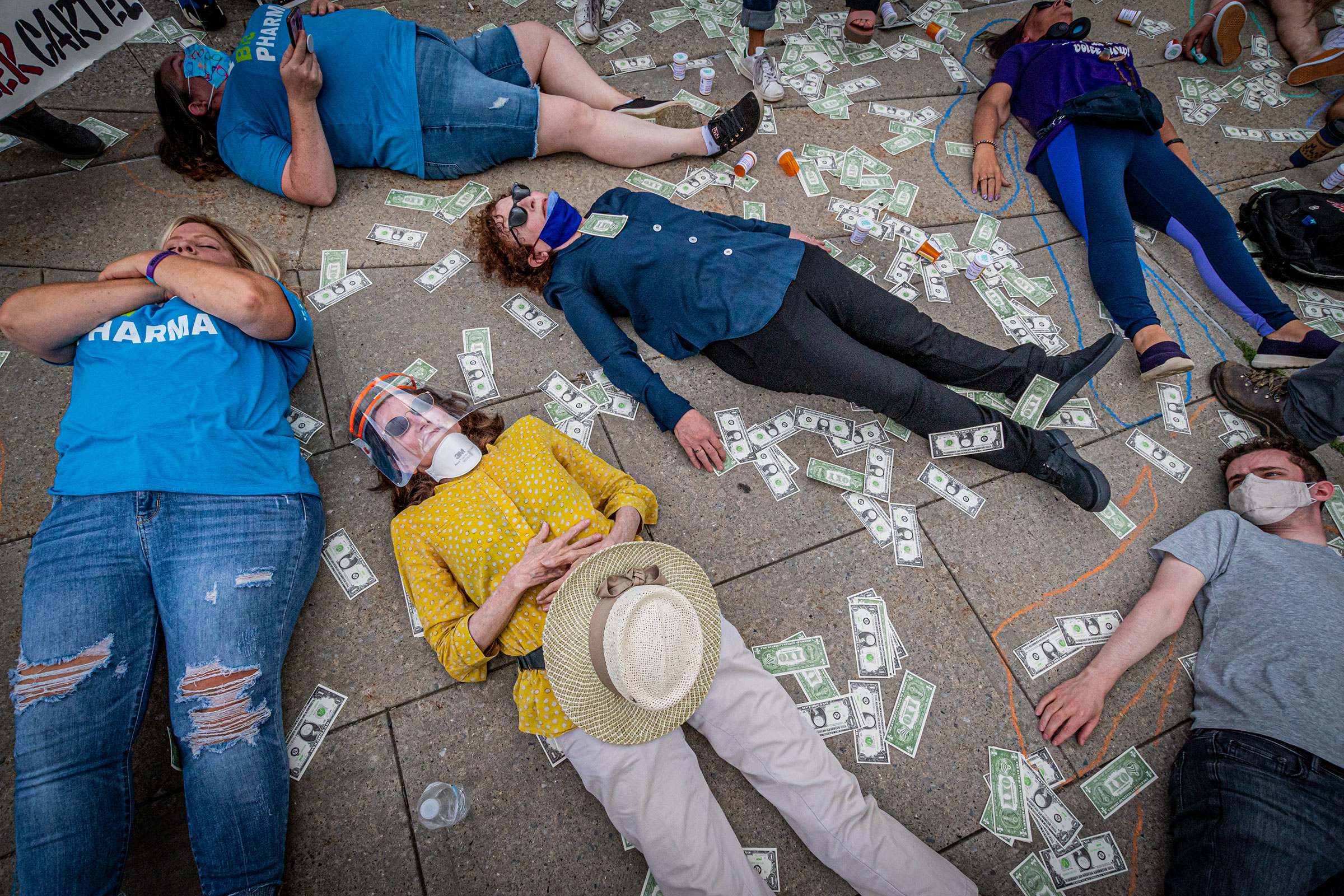 Protesters staging a die-in outside the courthouse. Members