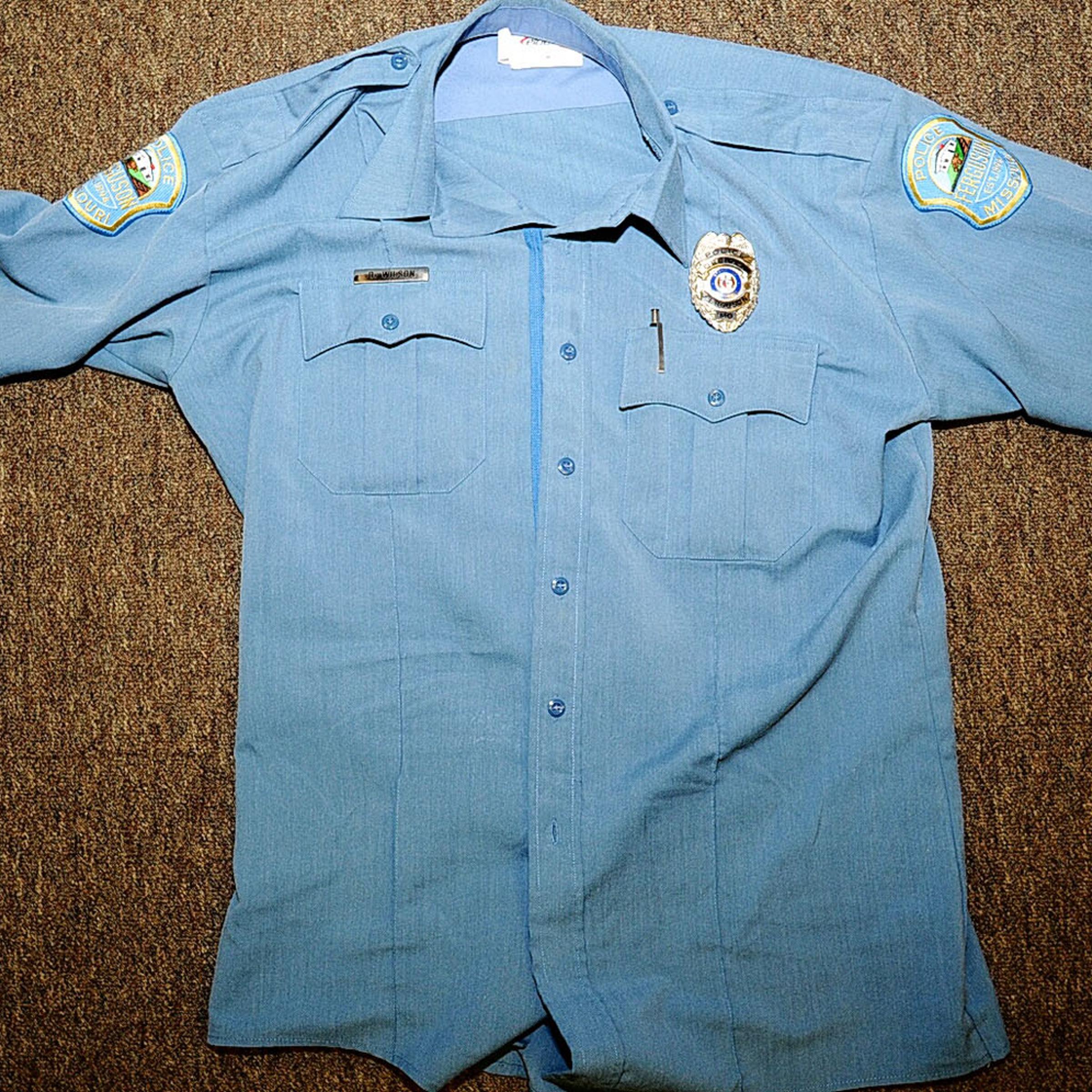 An undated evidence photograph made available by the St. Louis County prosecutors office on Nov. 25, 2014 shows Ferguson police officer Darren Wilson's uniform taken after the shooting of Michael Brown.