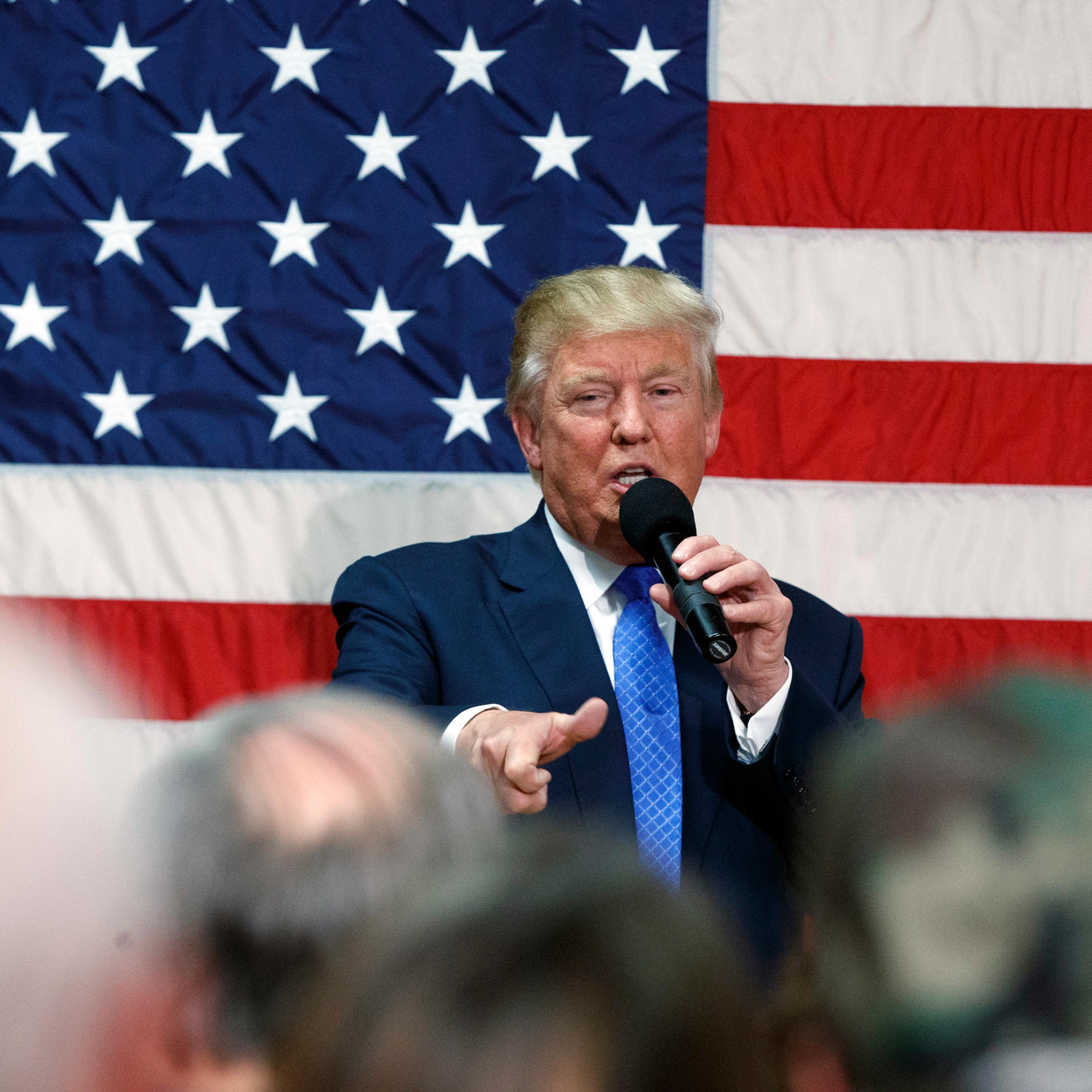 Republican presidential candidate Donald Trump speaks during a town hall, Thursday, Oct. 6, 2016, in Sandown, N.H. (AP Photo/ Evan Vucci)